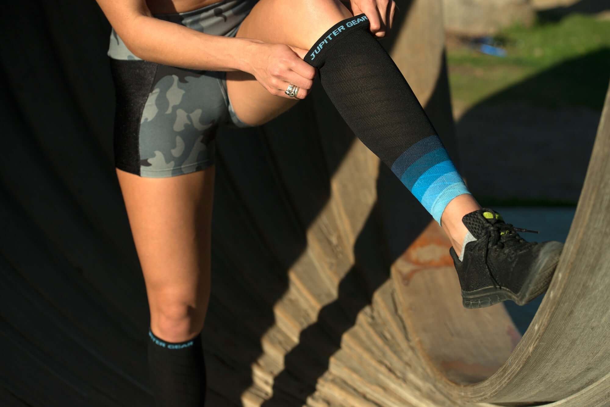 Endurance Compression Calf & Leg Sleeve designed for running and hiking, featuring gradient zoned compression panels for optimal support.