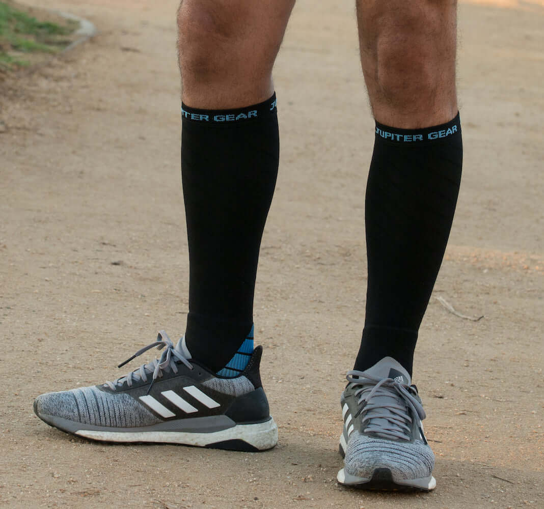 Endurance Compression Socks designed for running and hiking, featuring graduated compression technology and moisture-wicking fabric.