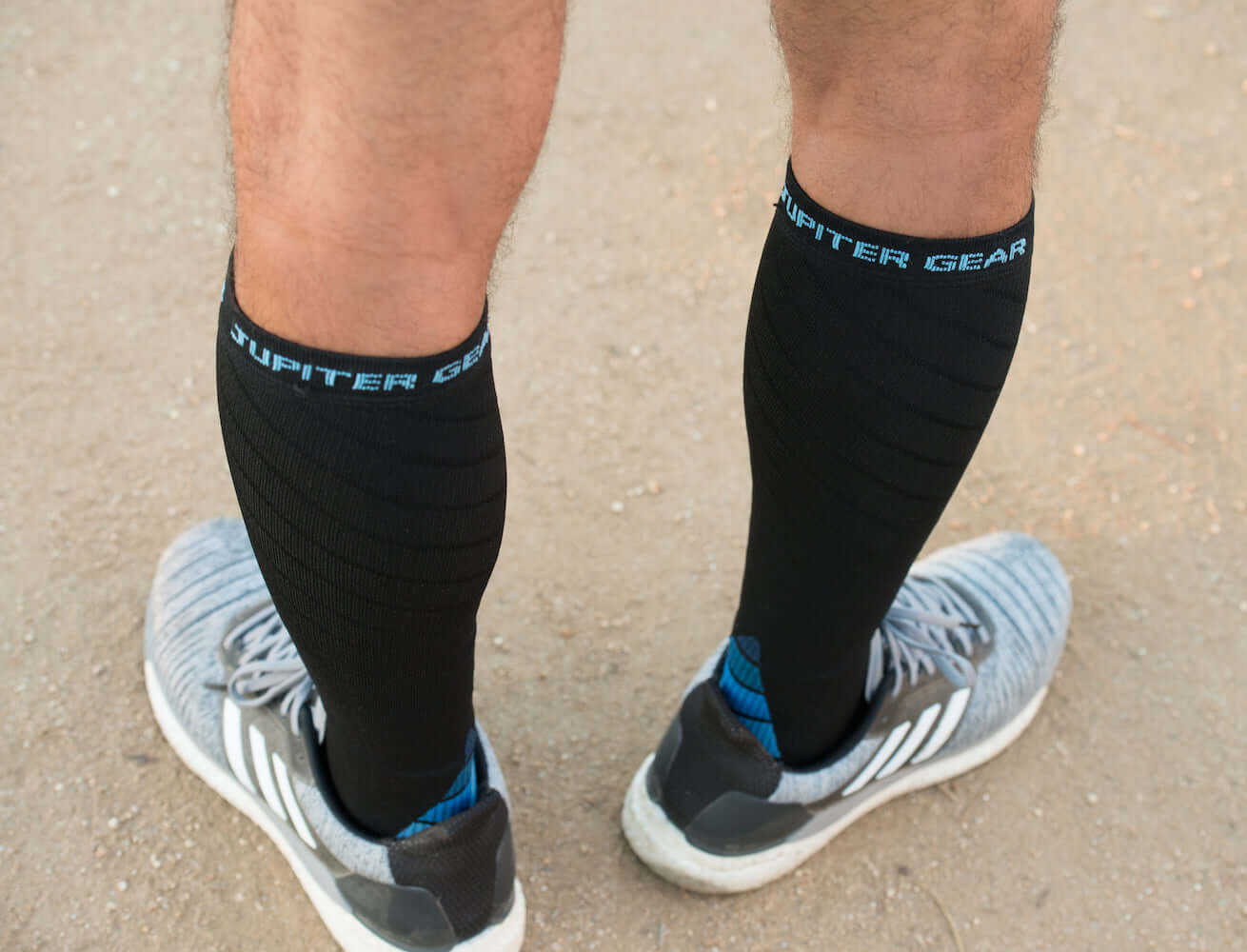 Endurance Compression Socks designed for running and hiking, featuring graduated compression technology and moisture-wicking fabric.