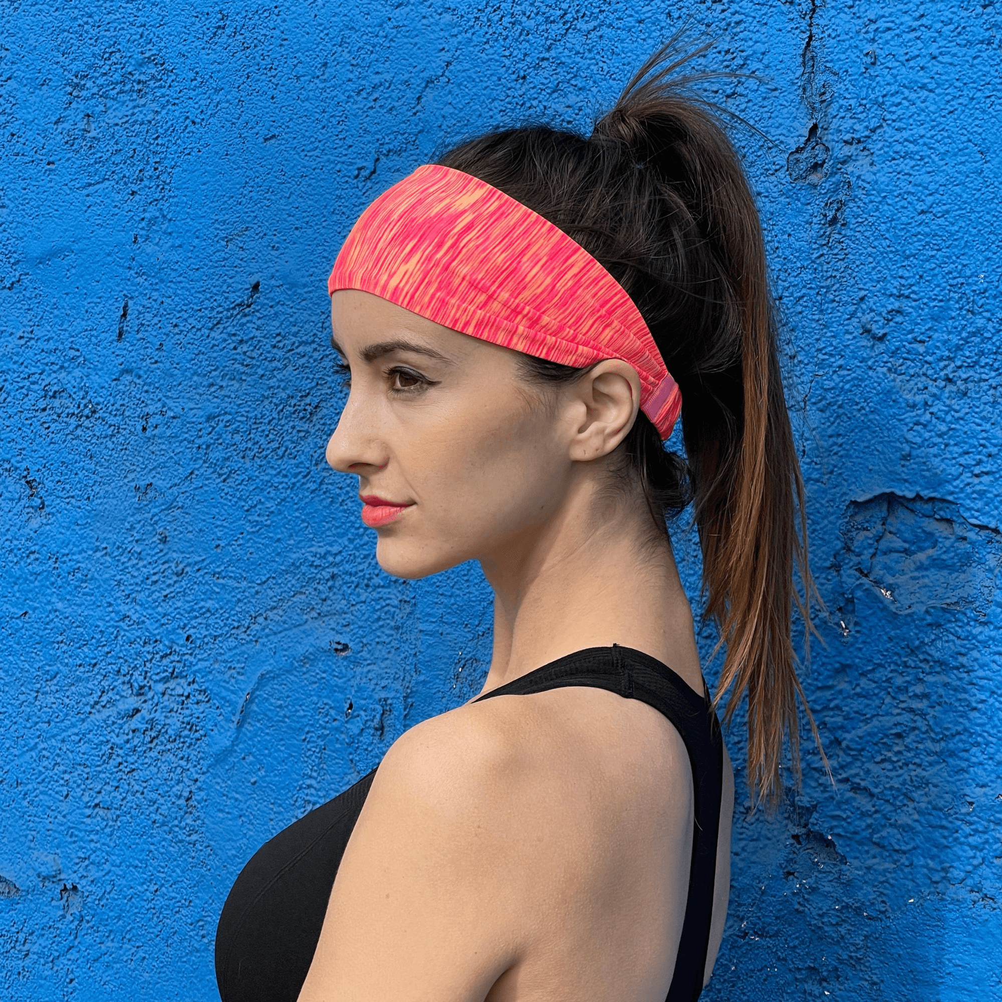 Extra-wide sport and fitness sweat-wicking headband in black, made from nylon-spandex blend, designed for comfort and performance during workouts.