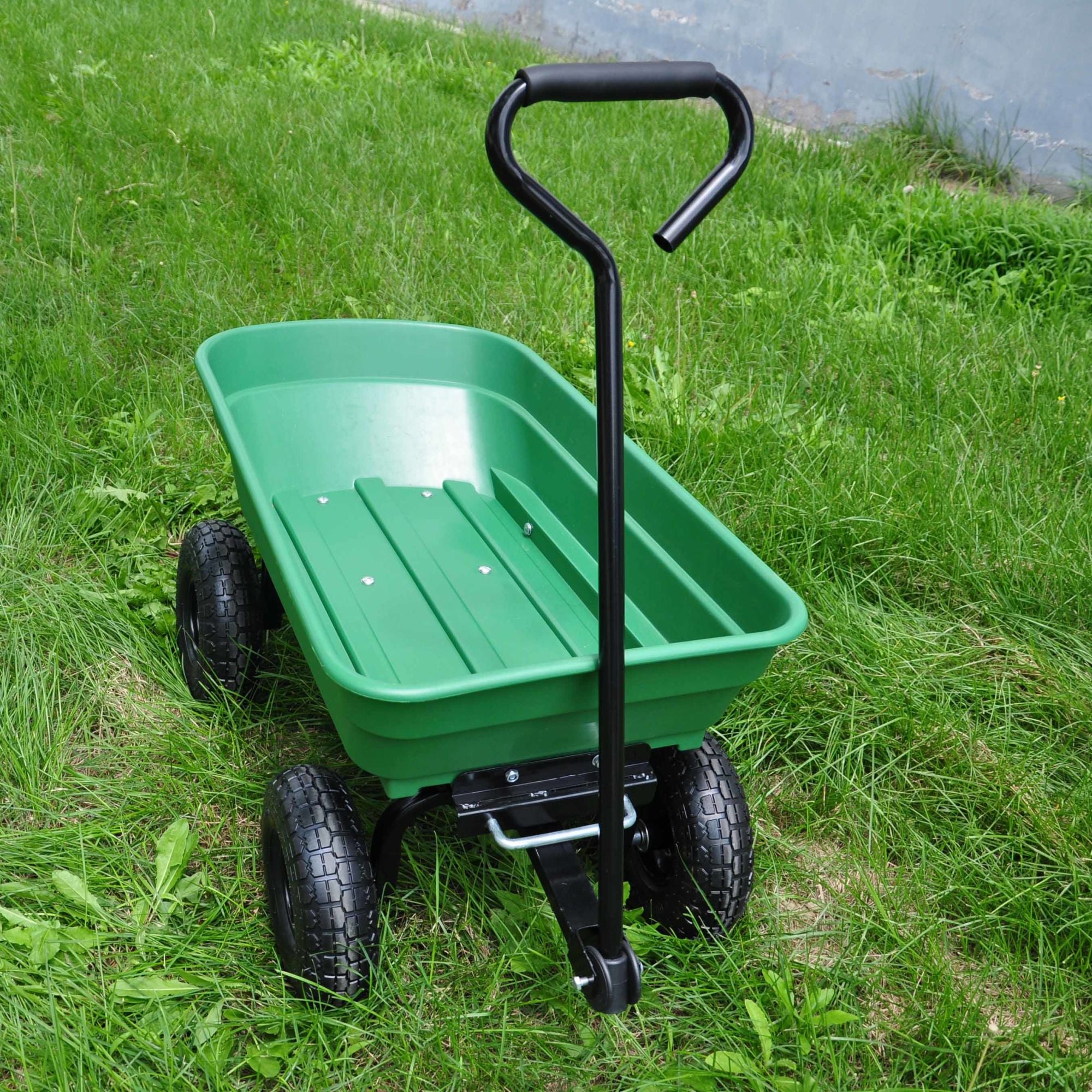 Poly Garden Dump Cart with steel frame and 10-inch pneumatic tires, designed for heavy loads and easy maneuverability.