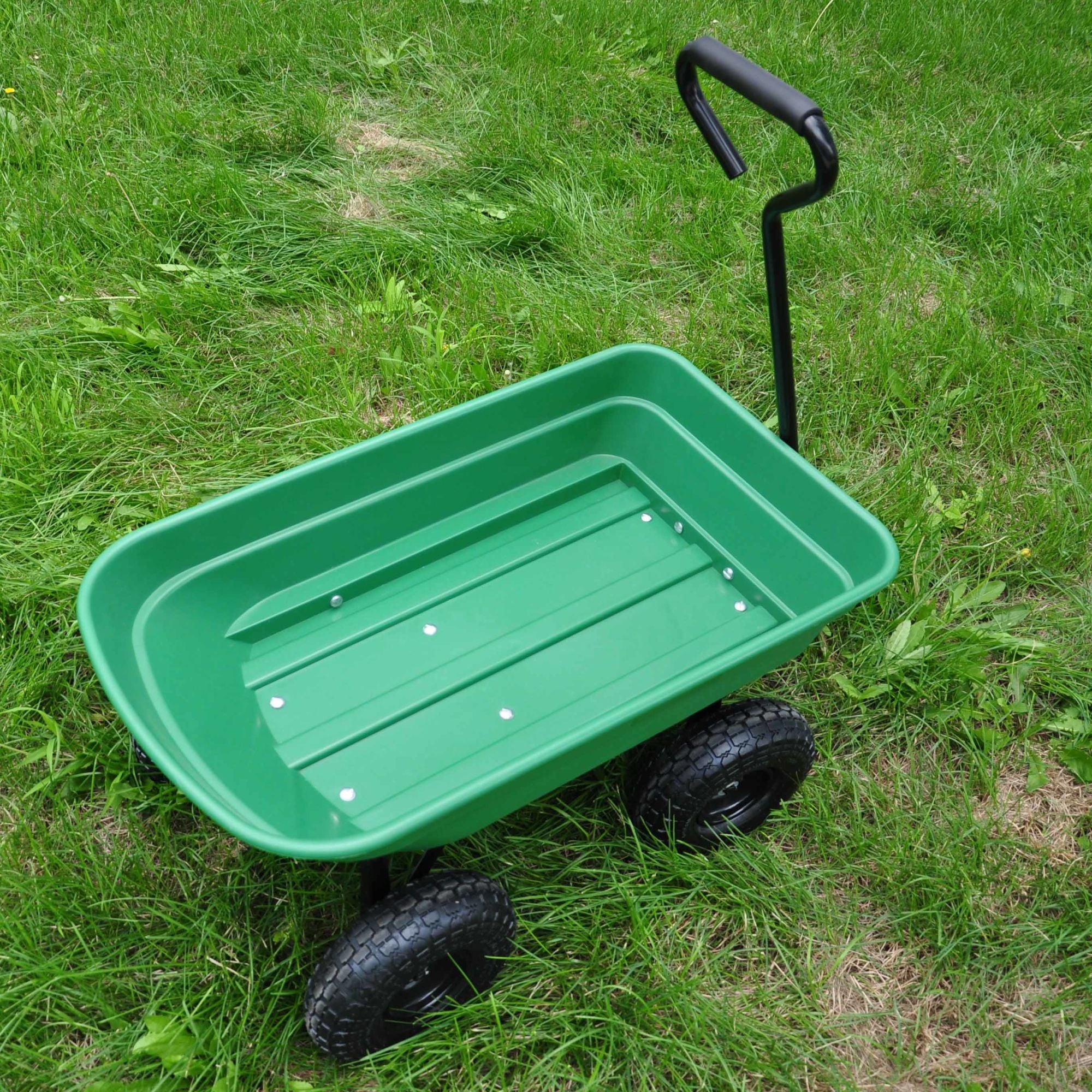 Poly Garden Dump Cart with steel frame and 10-inch pneumatic tires, designed for heavy loads and easy maneuverability.