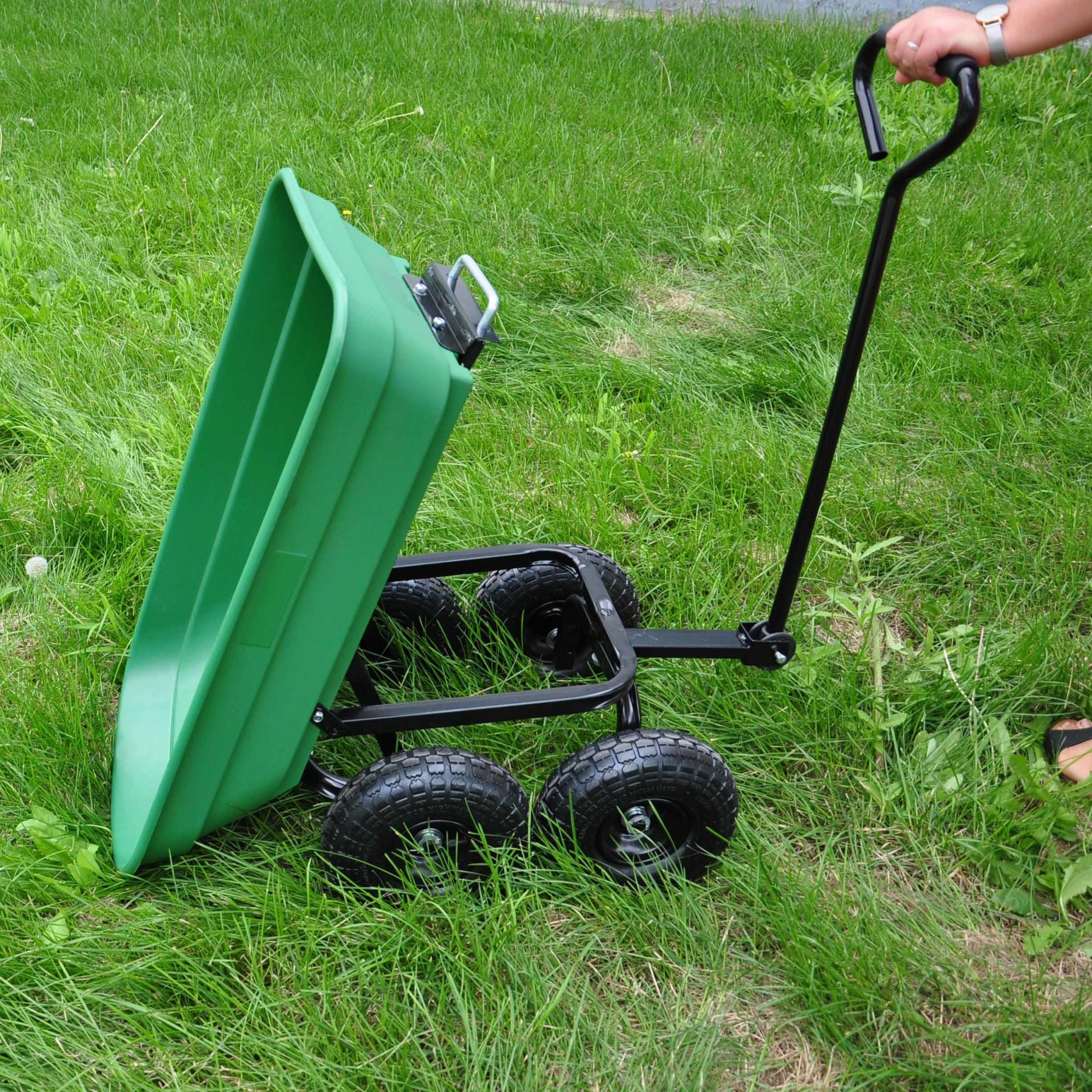 Poly Garden Dump Cart with steel frame and 10-inch pneumatic tires, designed for heavy loads and easy maneuverability.