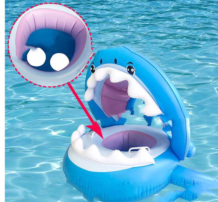 Inflatable swimming ring for kids featuring a shark design with a detachable awning for sun protection, perfect for pool fun.