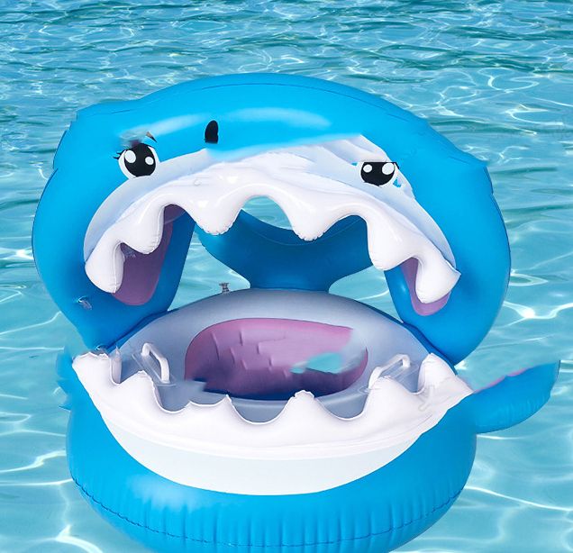 Inflatable swimming ring for kids featuring a shark design with a detachable awning for sun protection, perfect for pool fun.