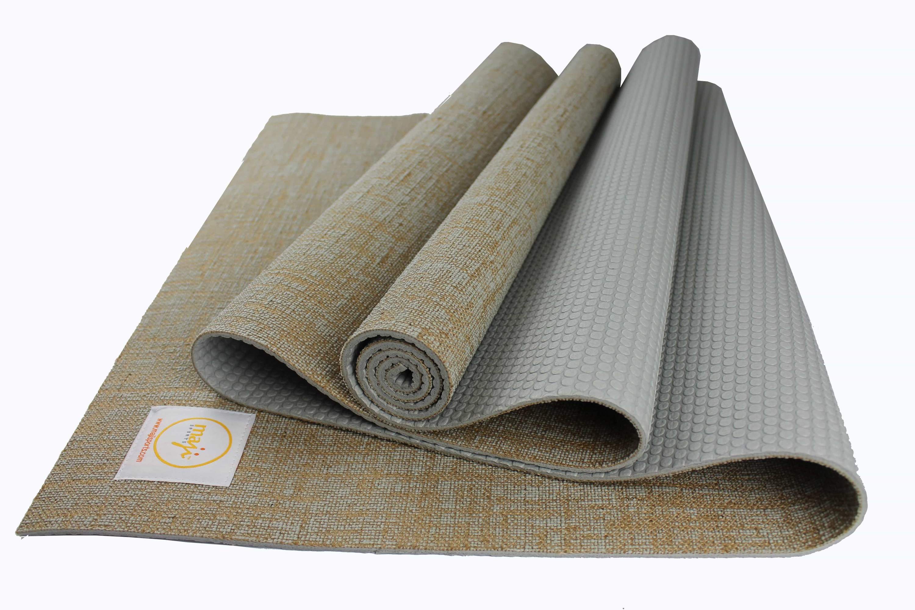 Jute Premium Eco Yoga Mat with textured surface and a small foot massager, showcasing eco-friendly materials and design.