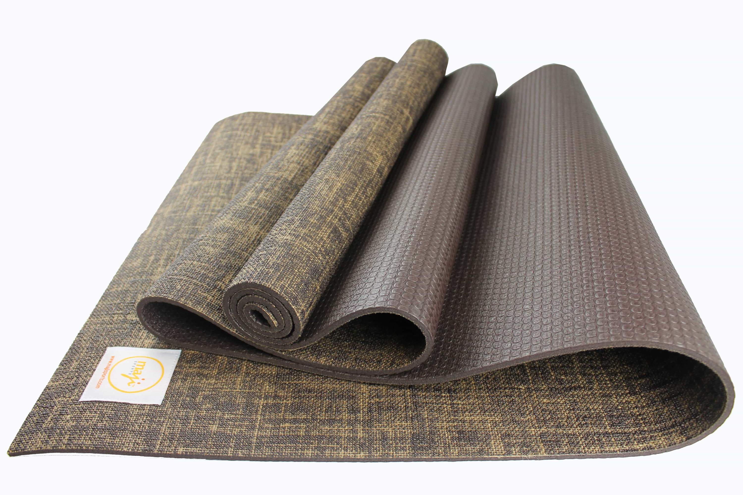 Jute Premium Eco Yoga Mat with textured surface and a small foot massager, showcasing eco-friendly materials and design.