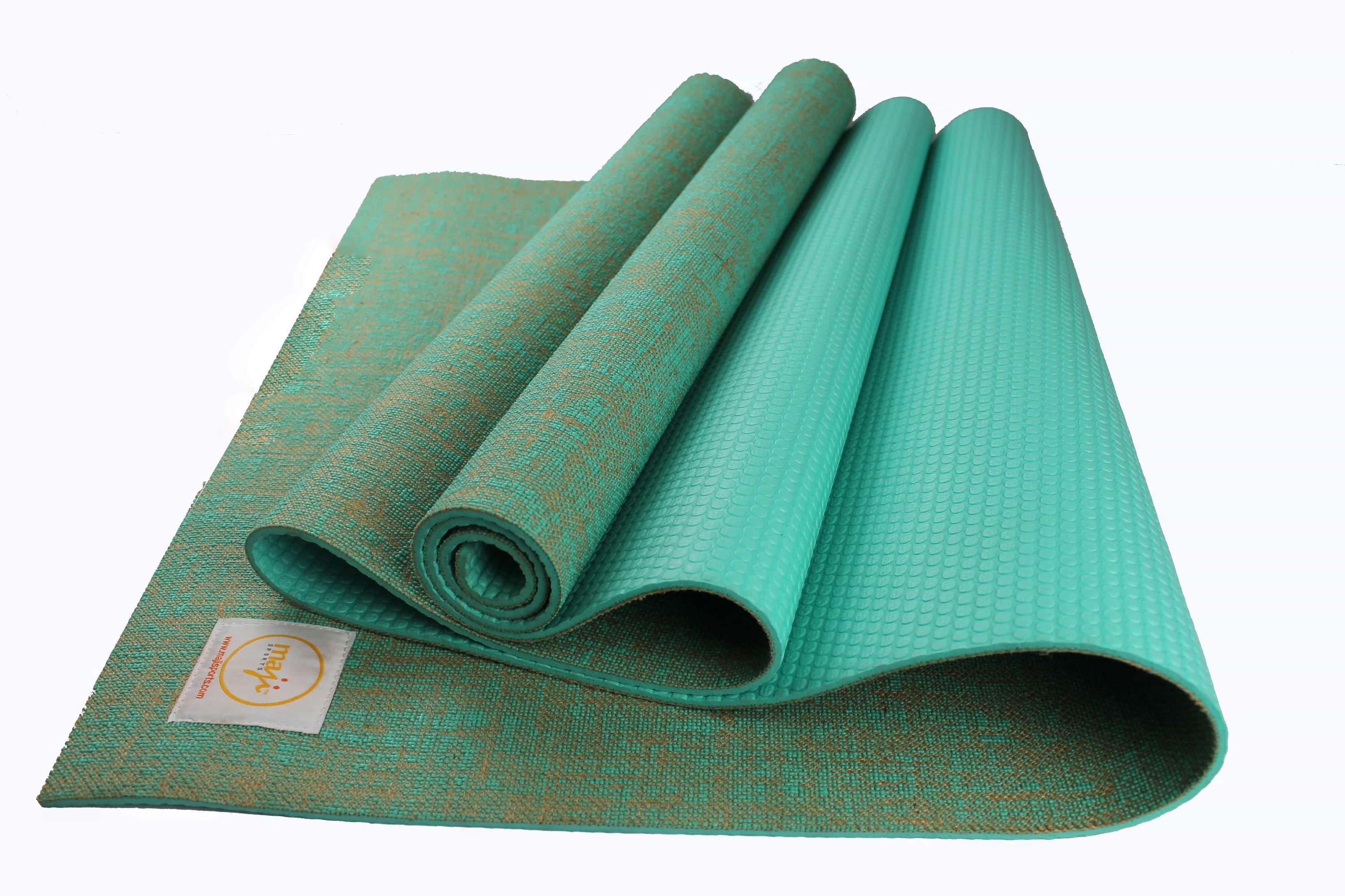 Jute Premium Eco Yoga Mat with textured surface and a small foot massager, showcasing eco-friendly materials and design.