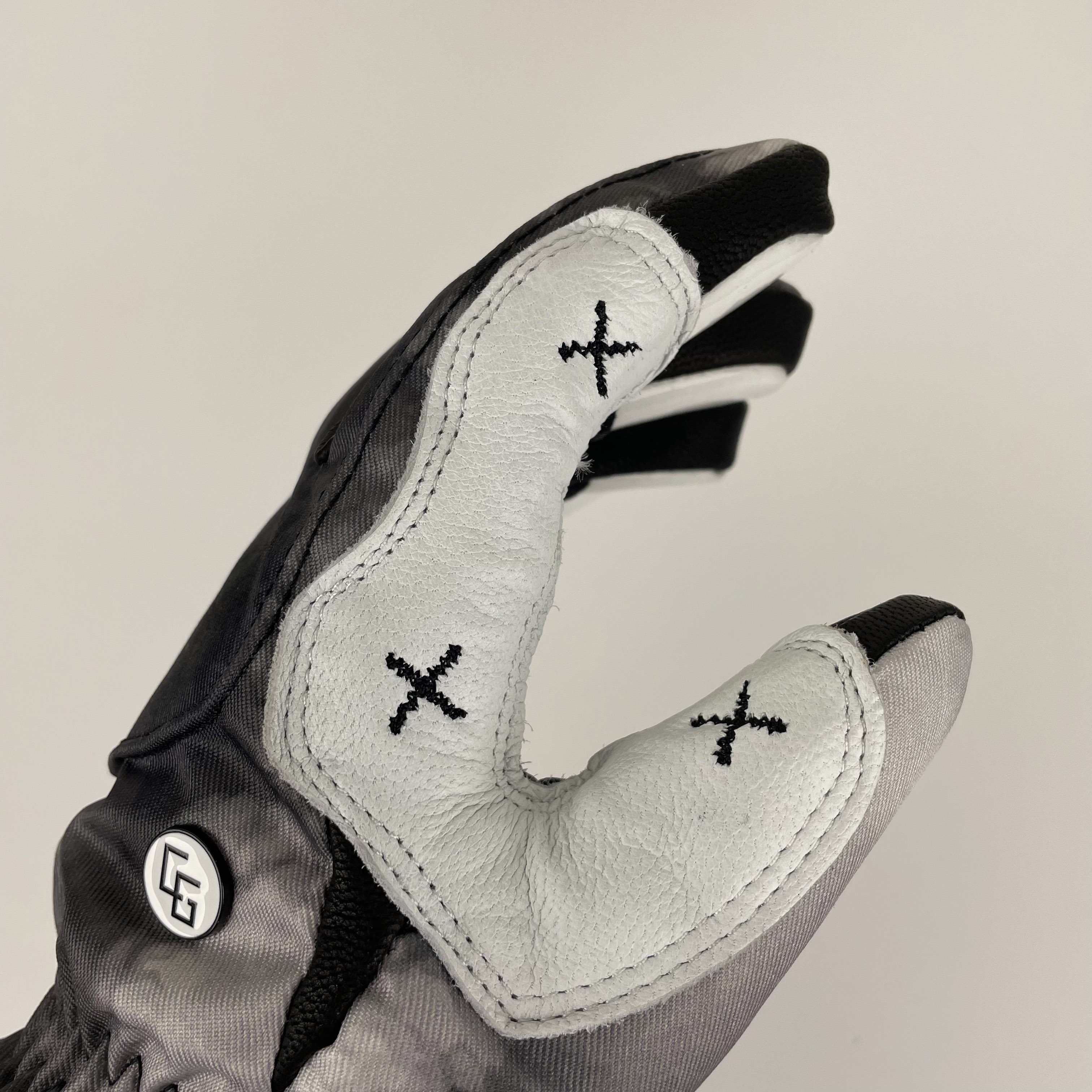 A pair of Park Gloves featuring genuine leather and a breathable waterproof membrane, designed for snowboarding in various conditions.