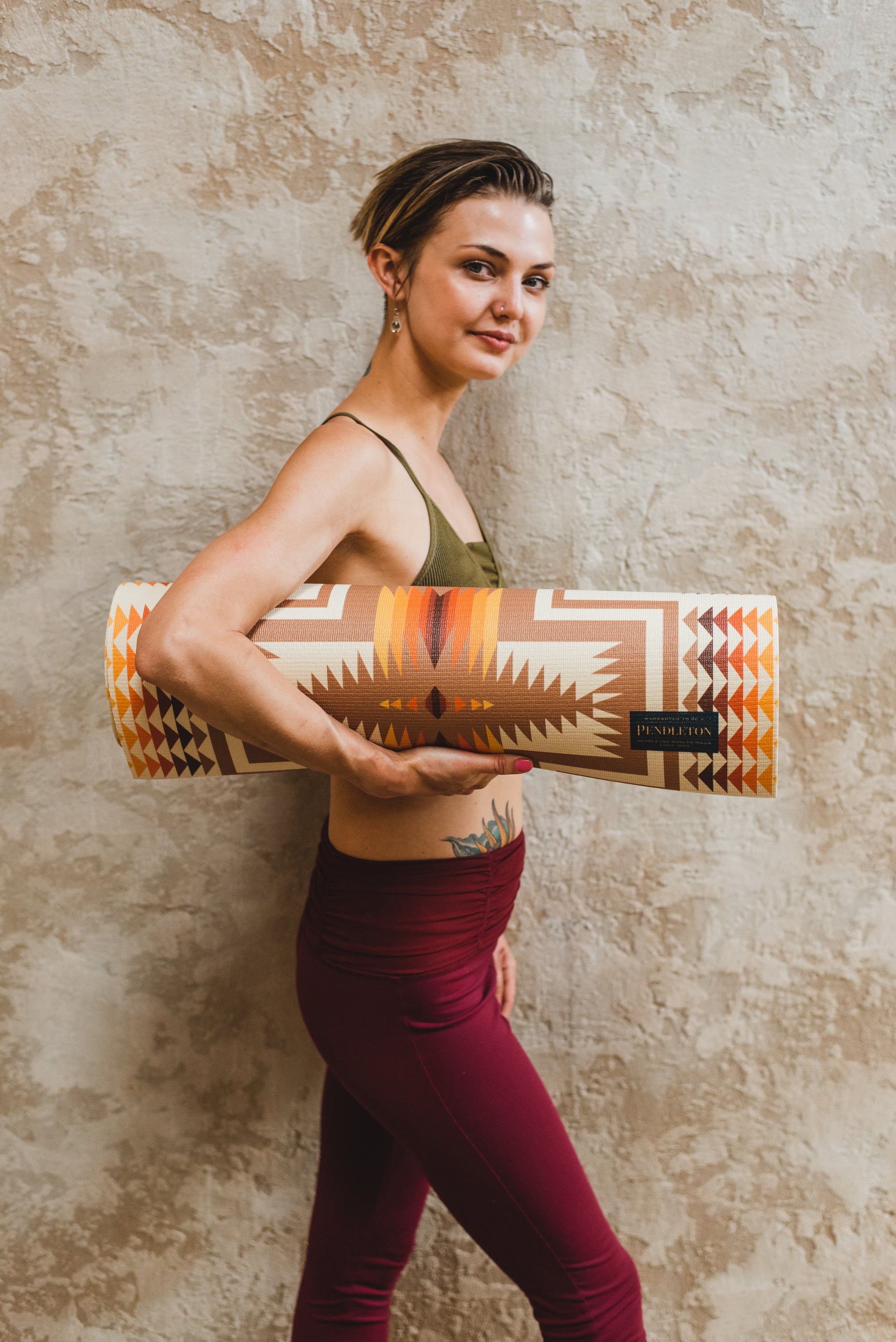 Pendleton x Yune Yoga Mat in Harding Tan color, featuring a textured surface for grip and a lightweight design for easy transport.