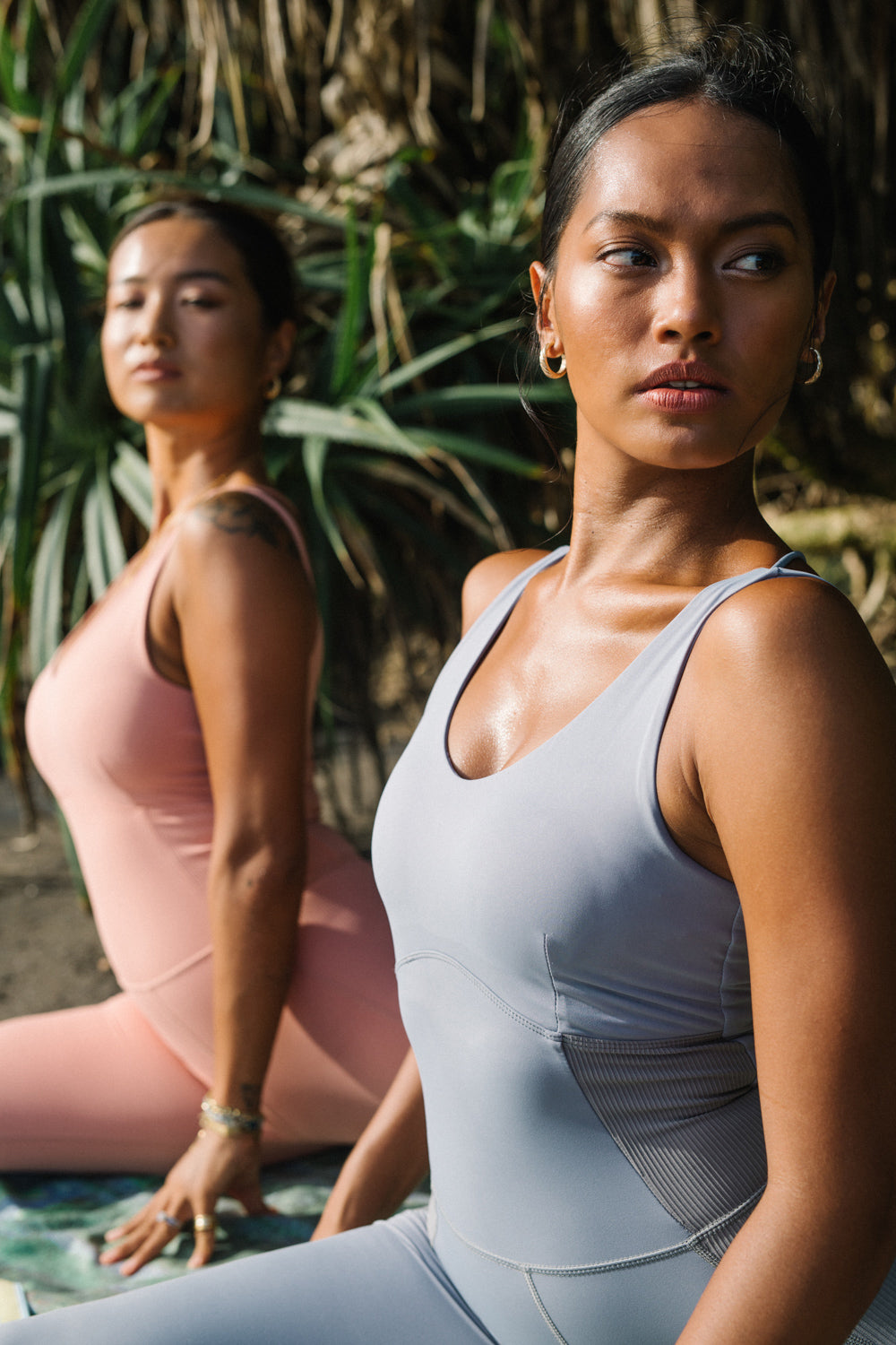 A stylish periwinkle flowform unitard designed for comfort and movement, featuring a seamless design and strappy back.