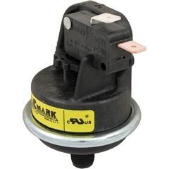 Round black pressure switch device.