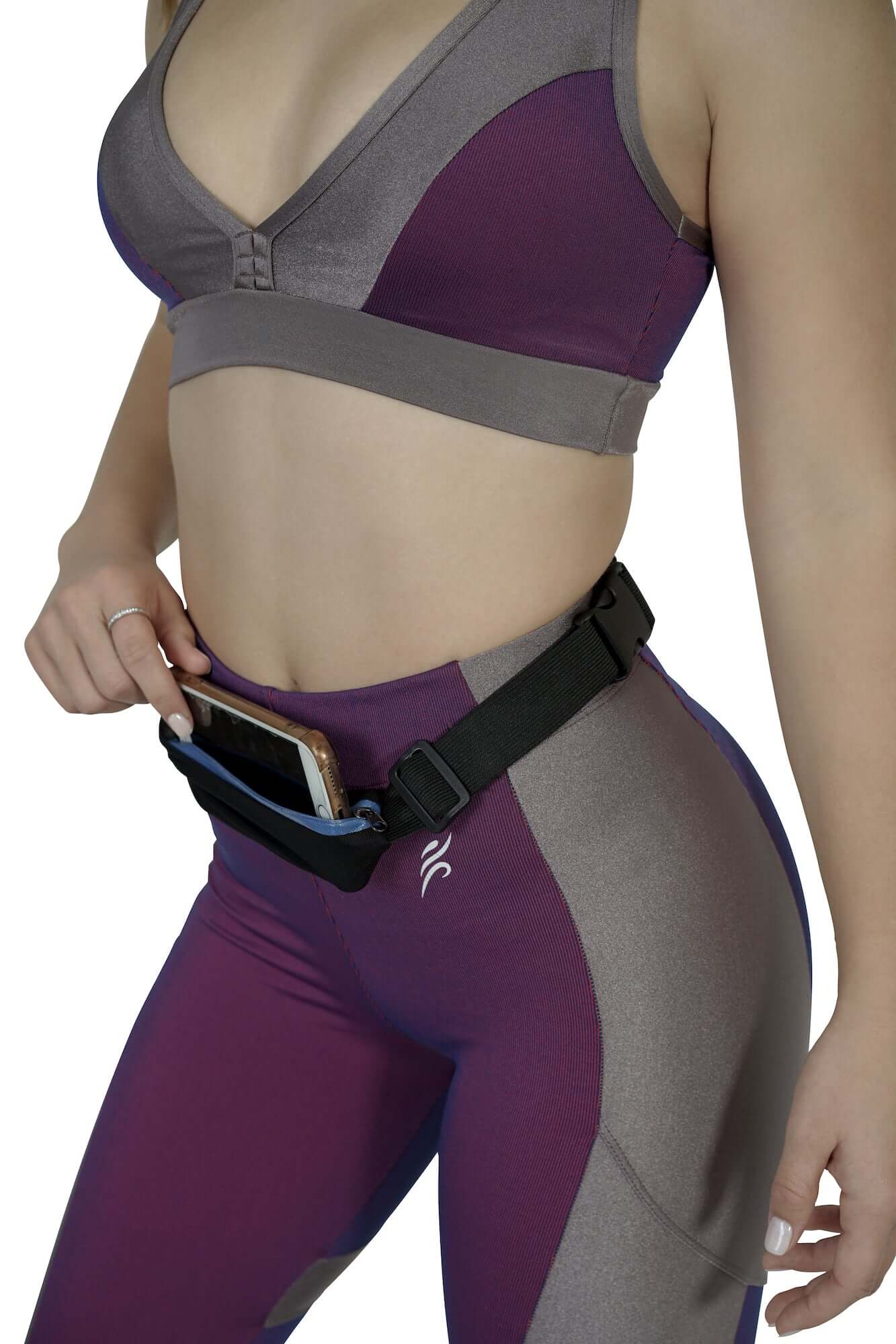 Stride Dual Pocket Running Belt in black, featuring two water-resistant pockets and an adjustable elastic waist belt, ideal for outdoor activities.