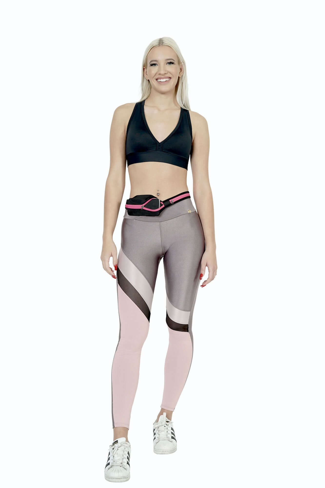 Stride Dual Pocket Running Belt in black, featuring two water-resistant pockets and an adjustable elastic waist belt, ideal for outdoor activities.