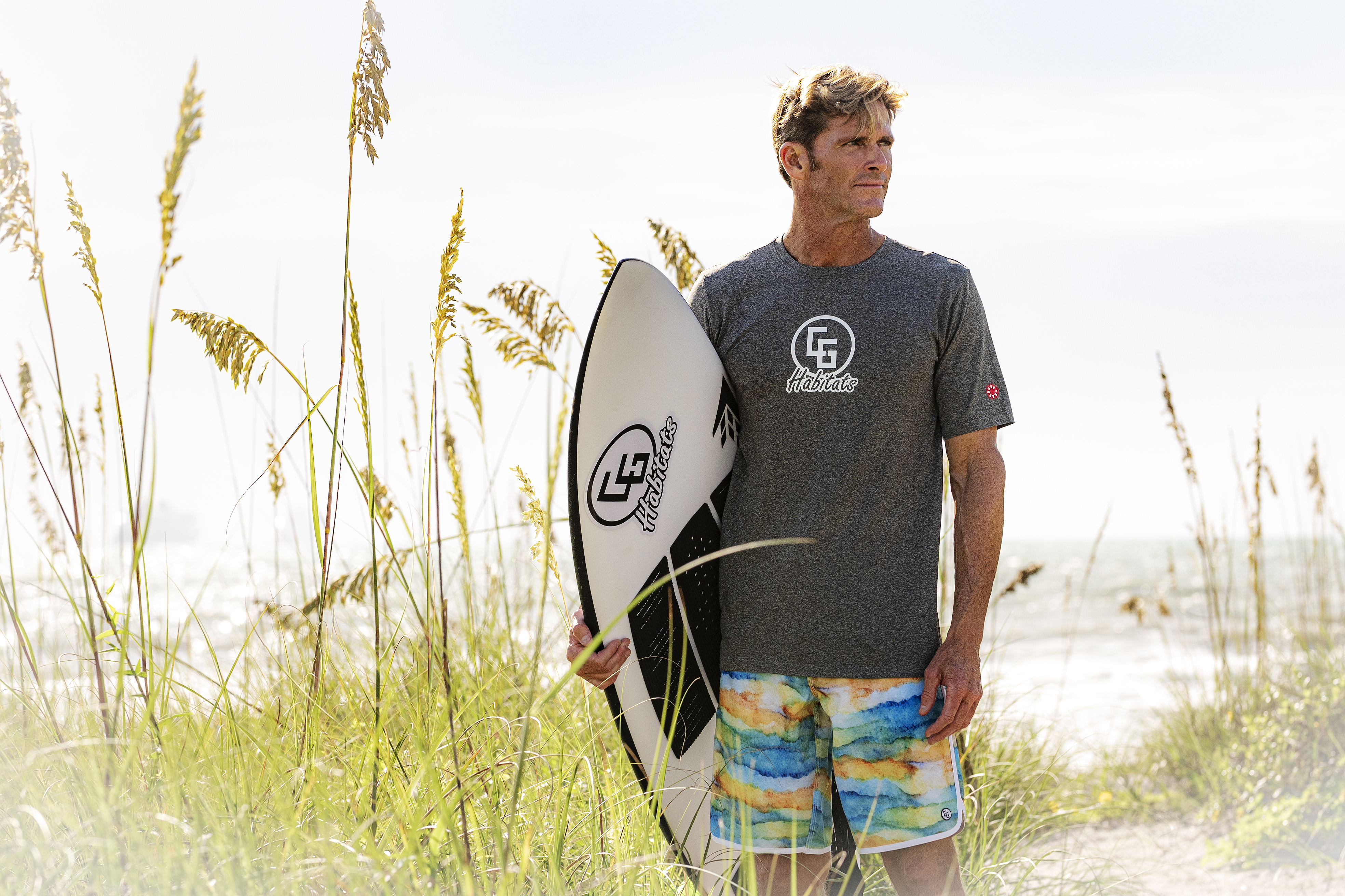 Tech T-Shirt featuring Habitats Logo, made from 79% Nylon and 21% Polyester, showcasing moisture-wicking and UV protectant properties.