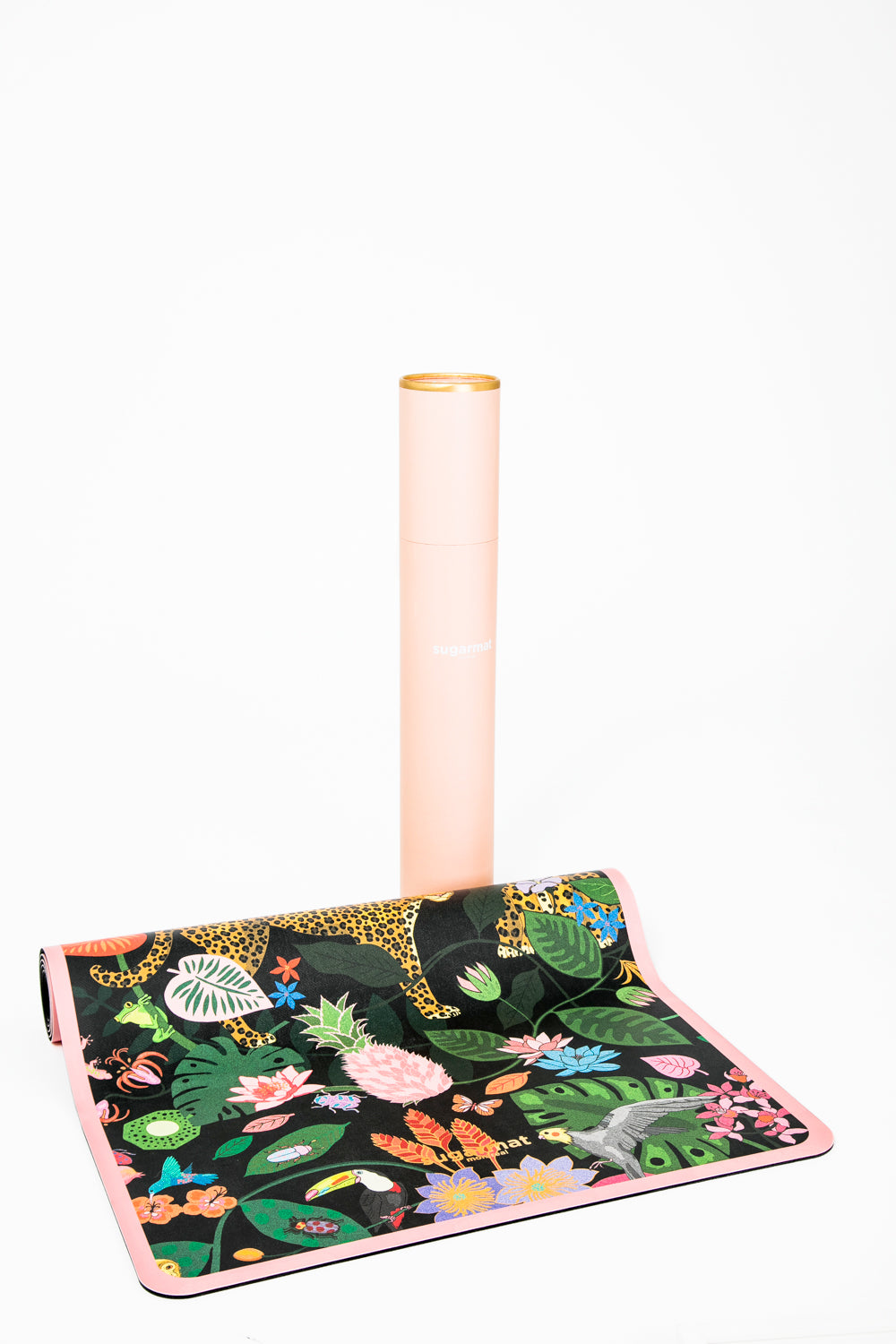 The Spotty Paradise LUX PU Yoga Mat featuring vibrant flora and fauna design, perfect for yoga enthusiasts.