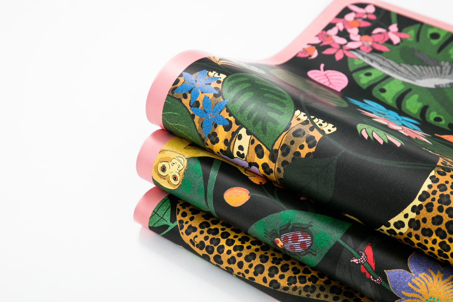 The Spotty Paradise LUX PU Yoga Mat featuring vibrant flora and fauna design, perfect for yoga enthusiasts.