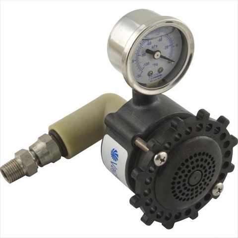 Industrial pressure gauge and pump.