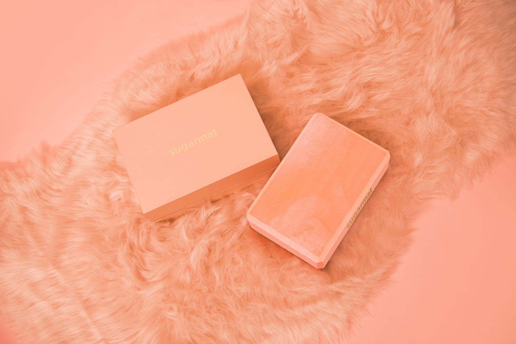 A pink yoga block made of high-density EVA foam, featuring beveled edges for grip, ideal for supporting various yoga poses.