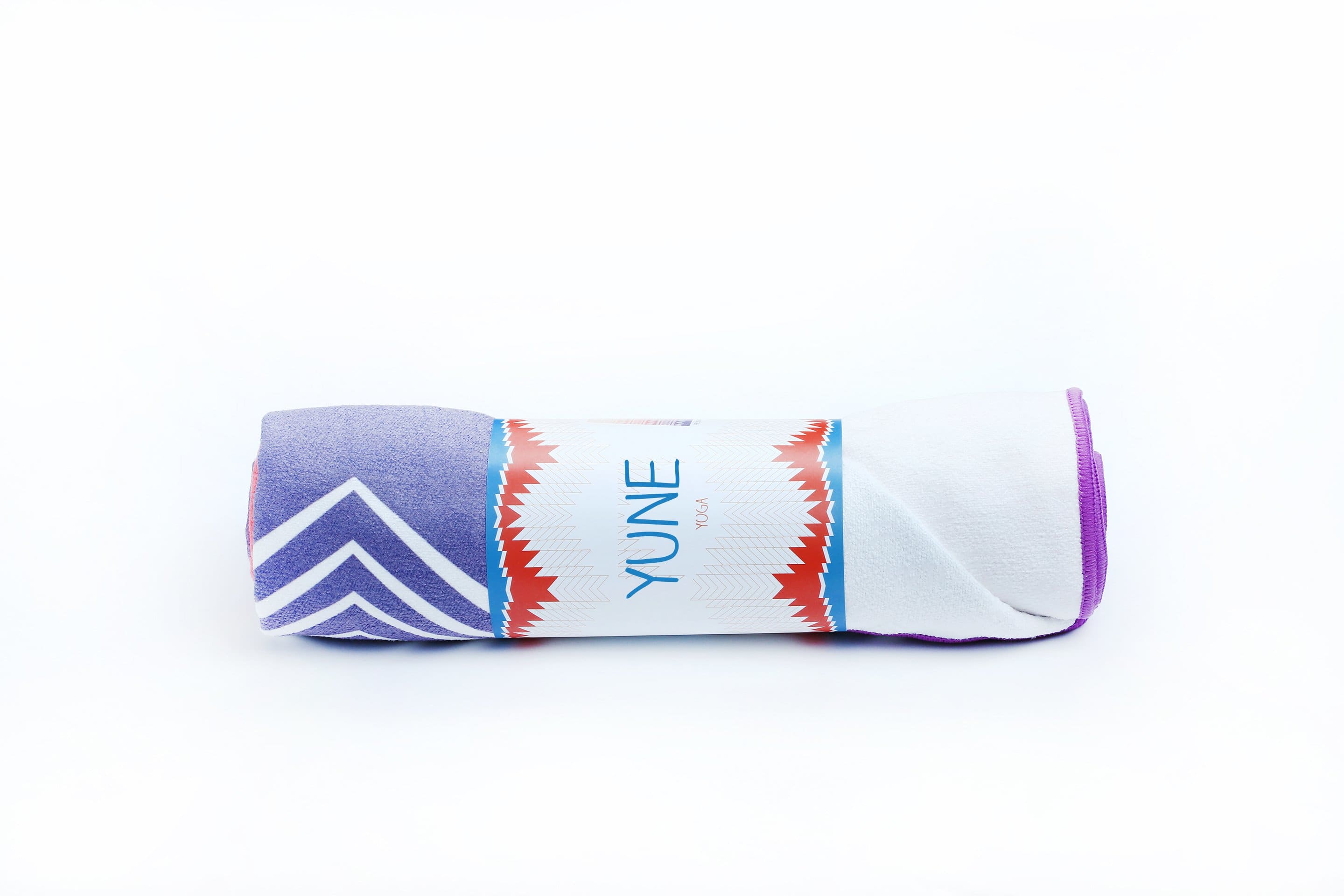 Yoga Towel Cassady in vibrant colors, showcasing its slip-resistant silicon underside and soft microfiber texture.