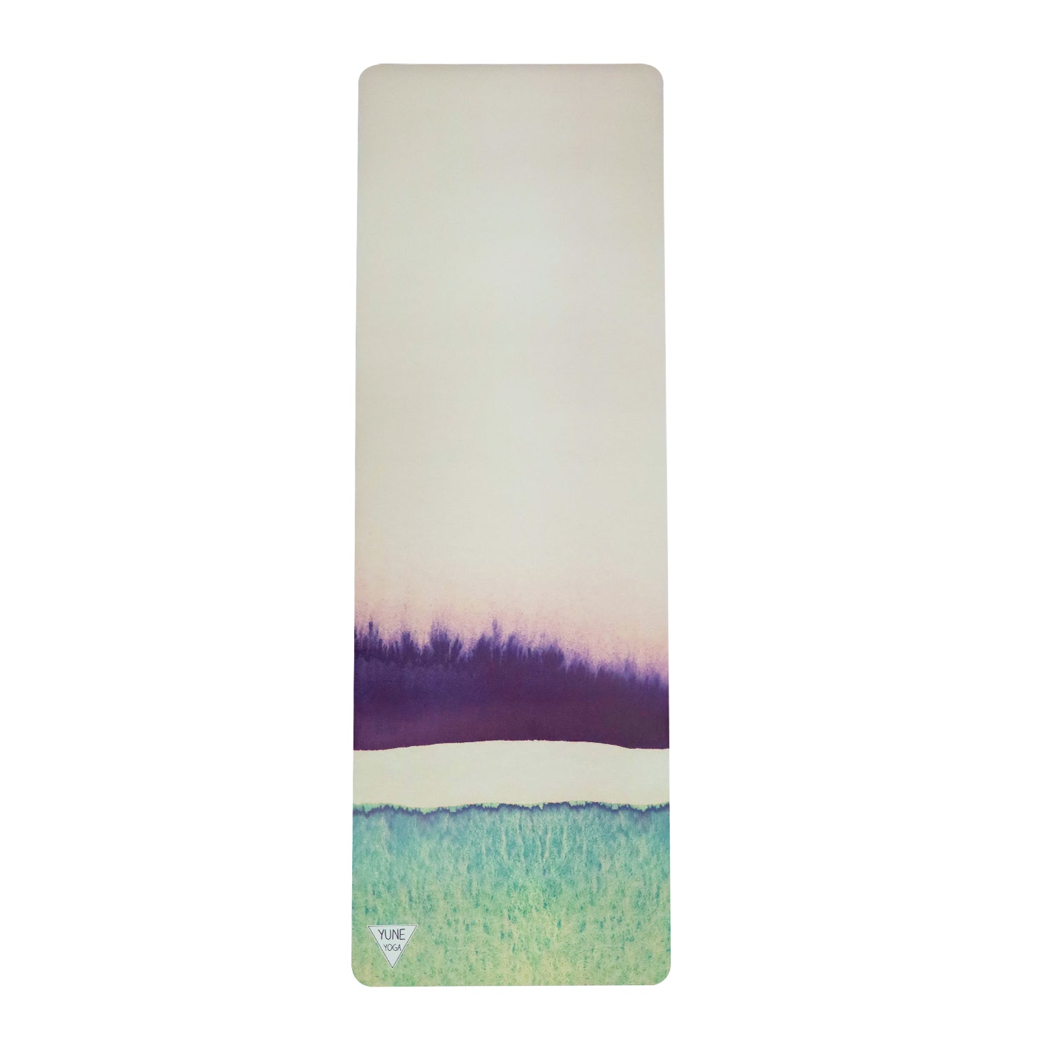 Yune Natural Rubber Yoga Mat Aphrodite in a serene yoga setting, showcasing its eco-friendly material and non-slip surface.