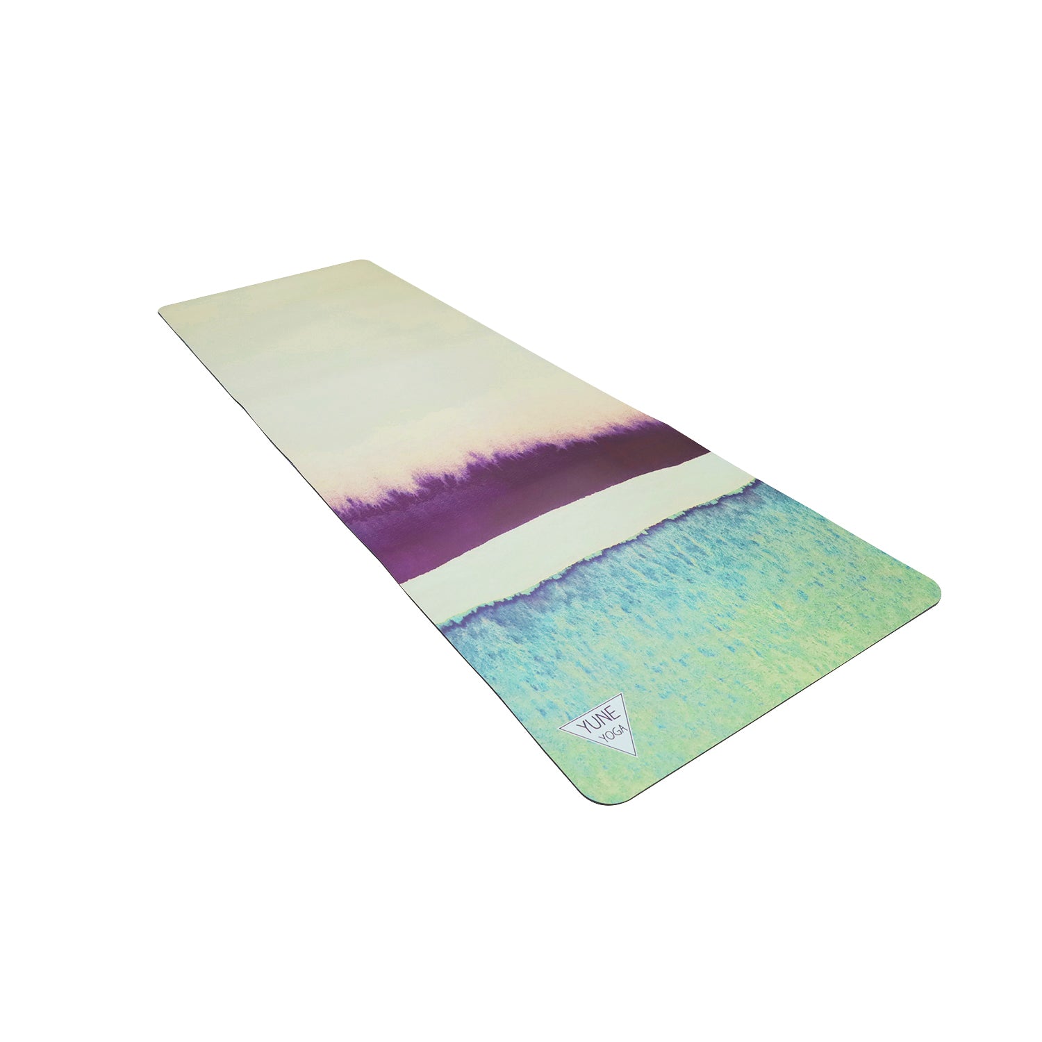 Yune Natural Rubber Yoga Mat Aphrodite in a serene yoga setting, showcasing its eco-friendly material and non-slip surface.