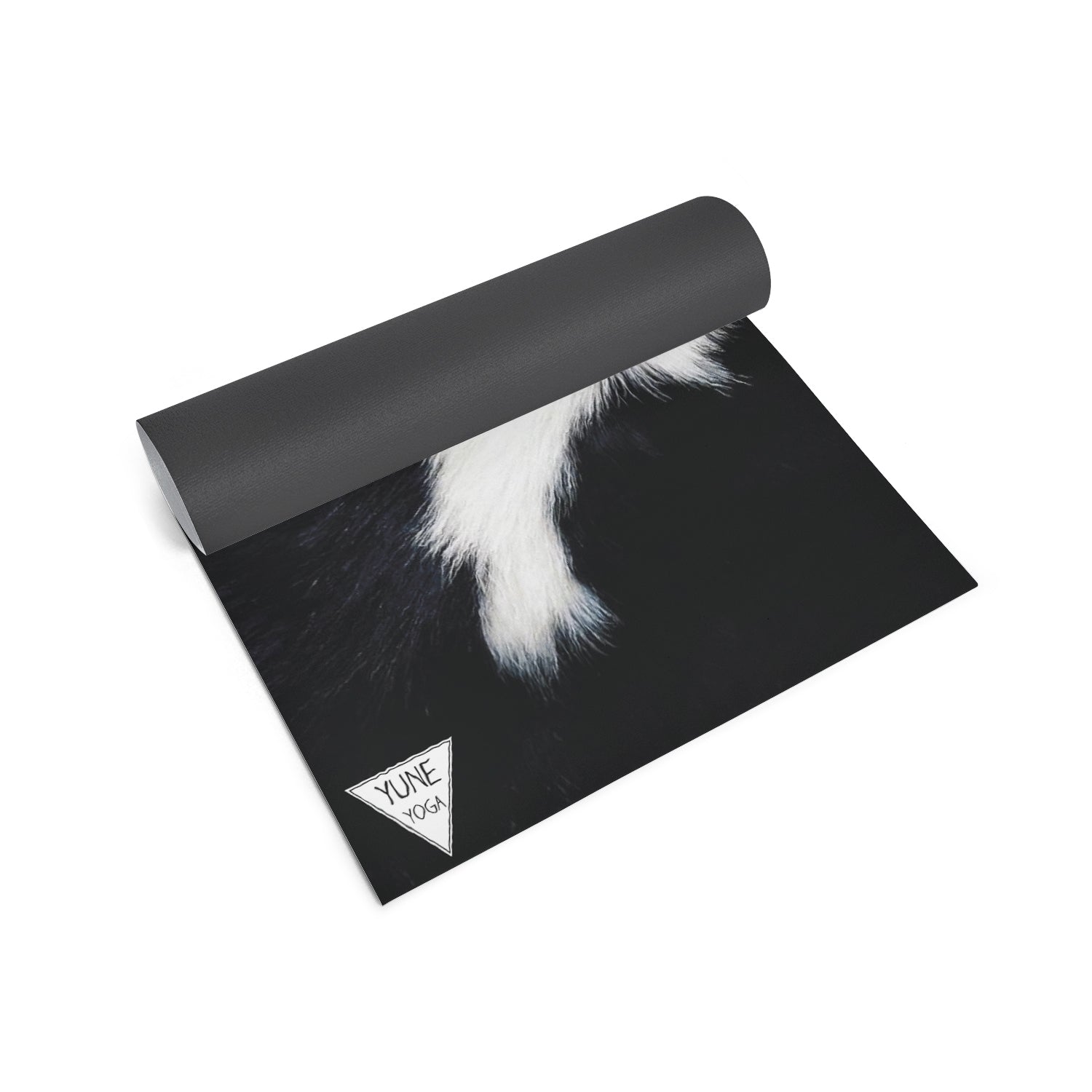 Yune Yoga Mat Cow 5mm featuring a unique cow design, made from eco-friendly materials, showcasing its non-slip texture and thickness.