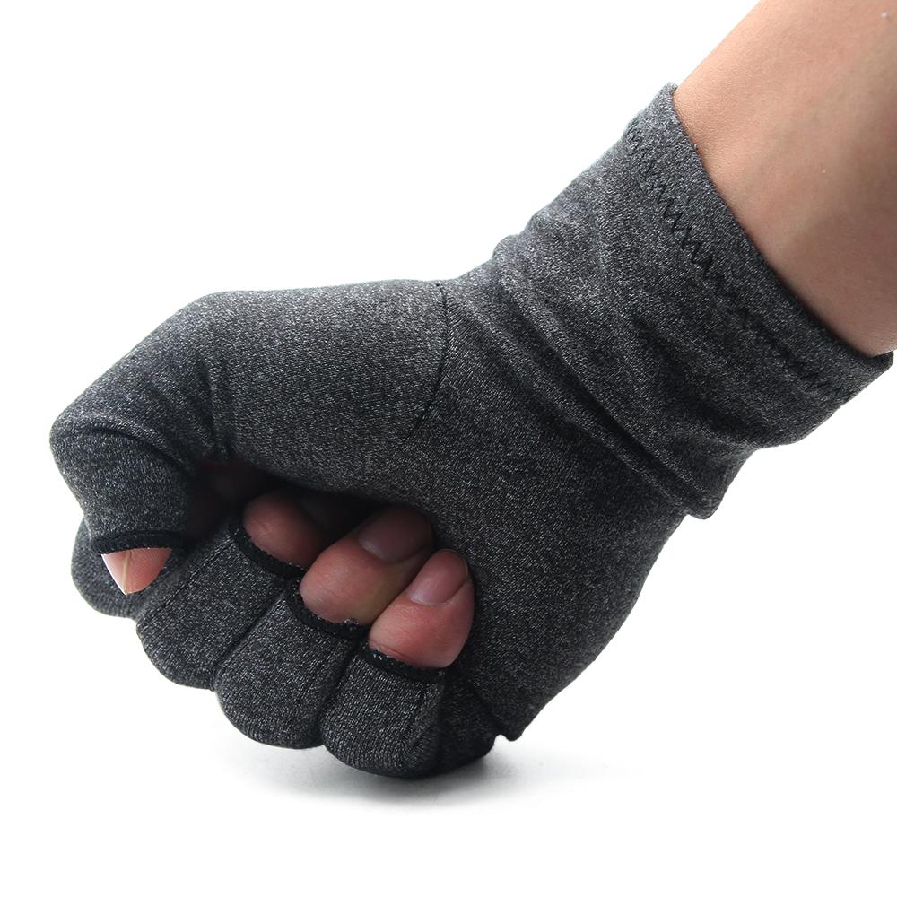 A pair of grey compression arthritis gloves designed for joint pain relief, featuring a fingerless design for enhanced dexterity.