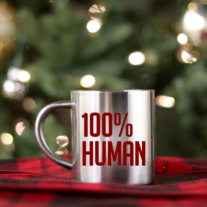 A stylish 100% Human Gold & Silver Mug made of ceramic with a luxurious gold metallic coating, showcasing its elegant design.