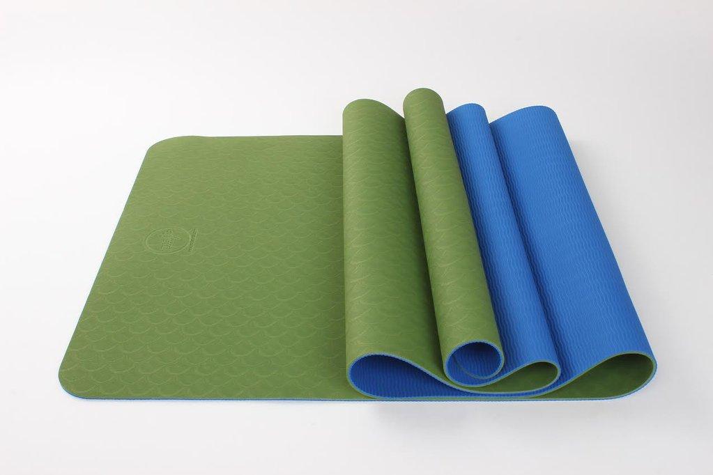 2 Tone TPE Premium Yoga Mat featuring a reversible embossed pattern in vibrant colors, designed for stability and comfort during yoga practice.