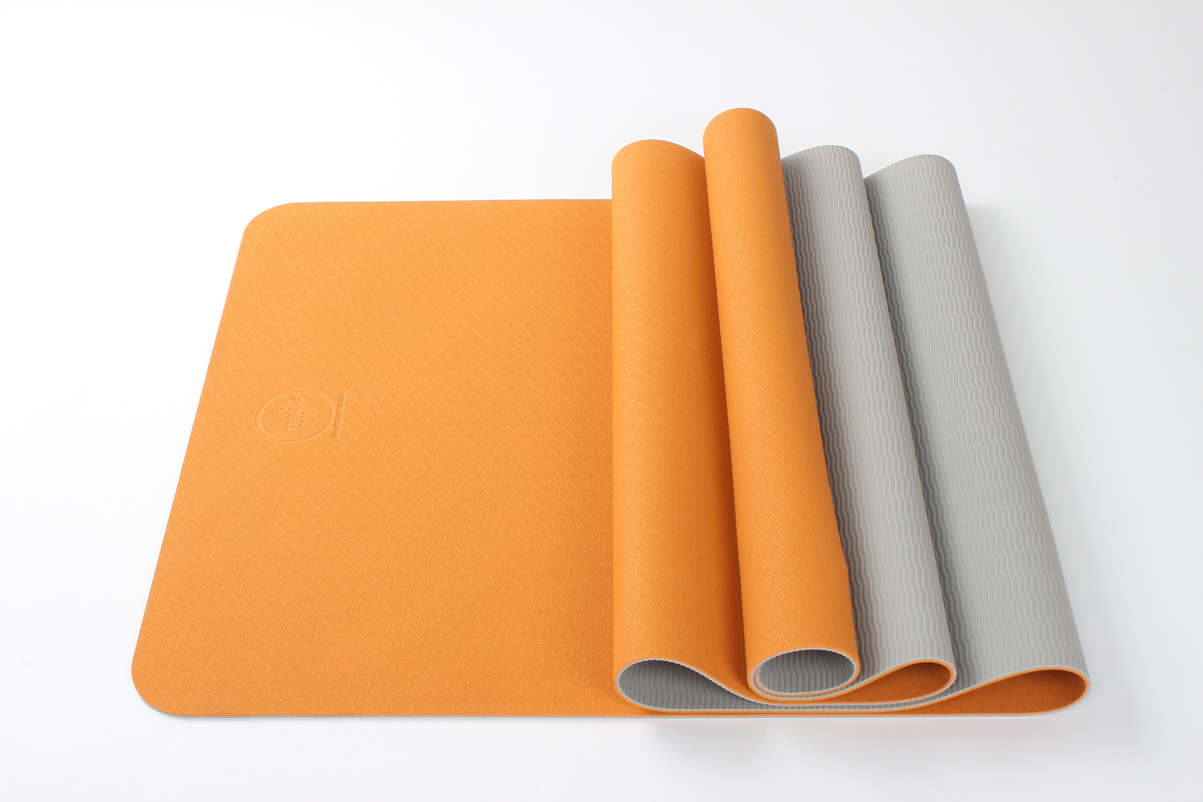 2 Tone TPE Premium Yoga Mat featuring a reversible embossed pattern in vibrant colors, designed for stability and comfort during yoga practice.