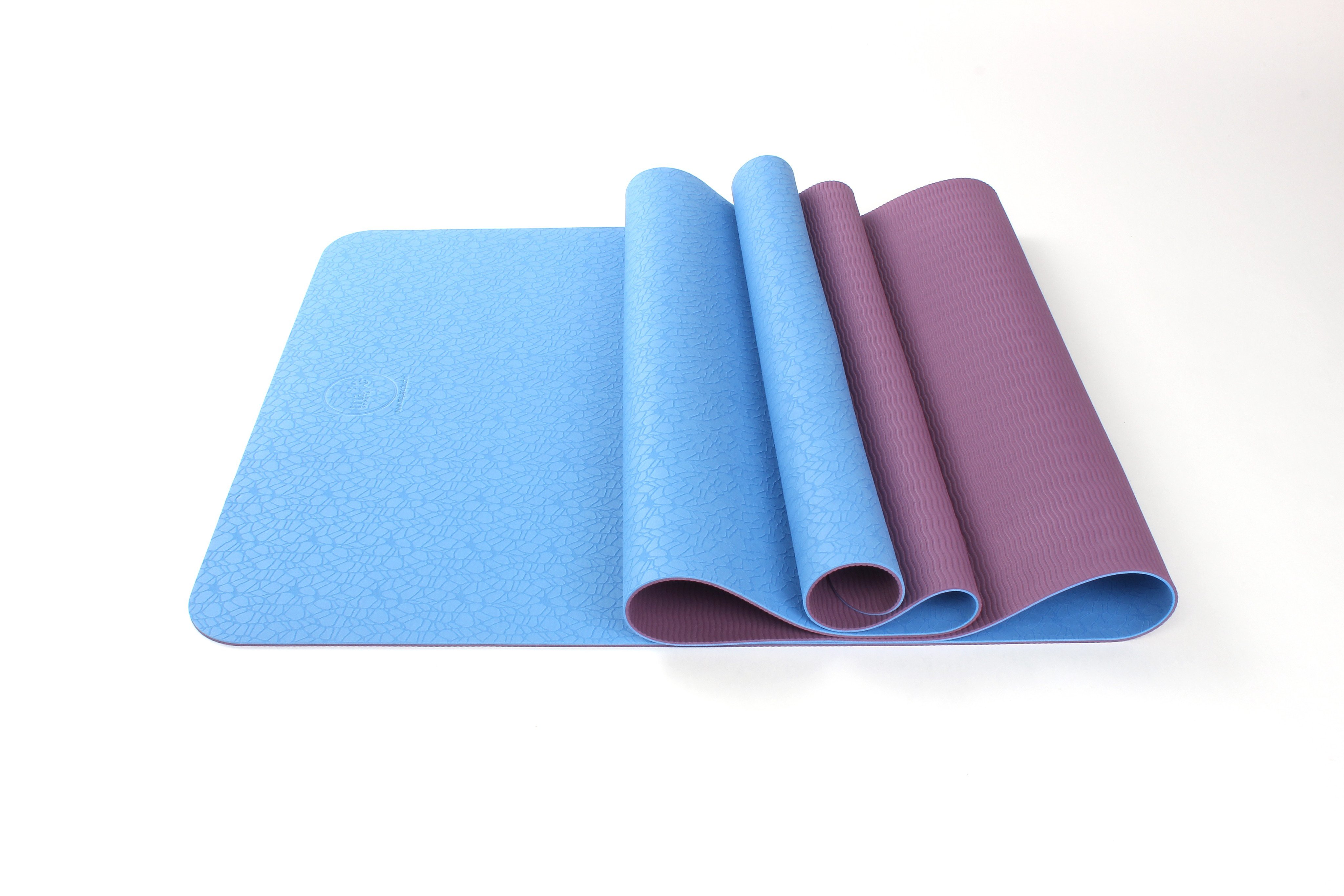 2 Tone TPE Premium Yoga Mat featuring a reversible embossed pattern in vibrant colors, designed for stability and comfort during yoga practice.