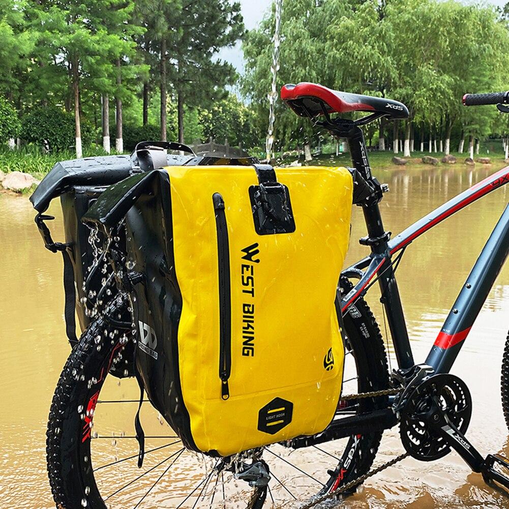 25L Waterproof Bicycle Carrier Bags mounted on a mountain bike rear seat rack, showcasing their spacious design and waterproof features.