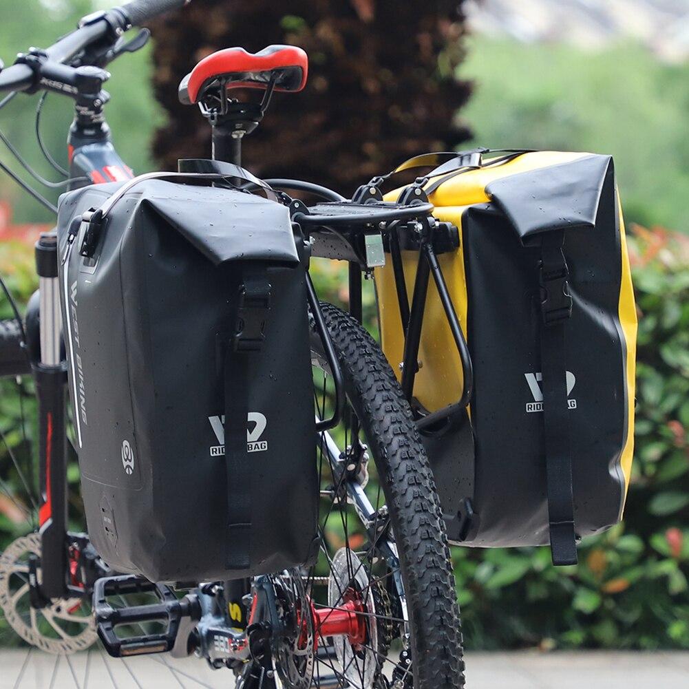 25L Waterproof Bicycle Carrier Bags mounted on a mountain bike rear seat rack, showcasing their spacious design and waterproof features.