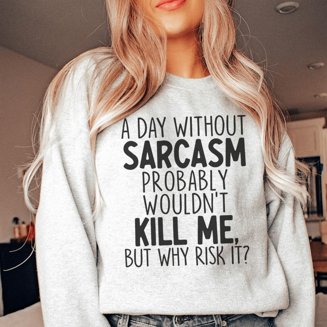 A Day Without Sarcasm sweatshirt featuring a unique artistic design, made from a soft cotton/poly fleece blend, perfect for casual wear.