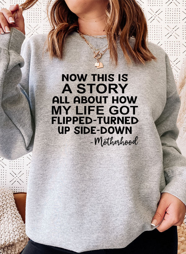 A cozy sweatshirt featuring unique designs celebrating motherhood, made from soft cotton/poly fleece blend.