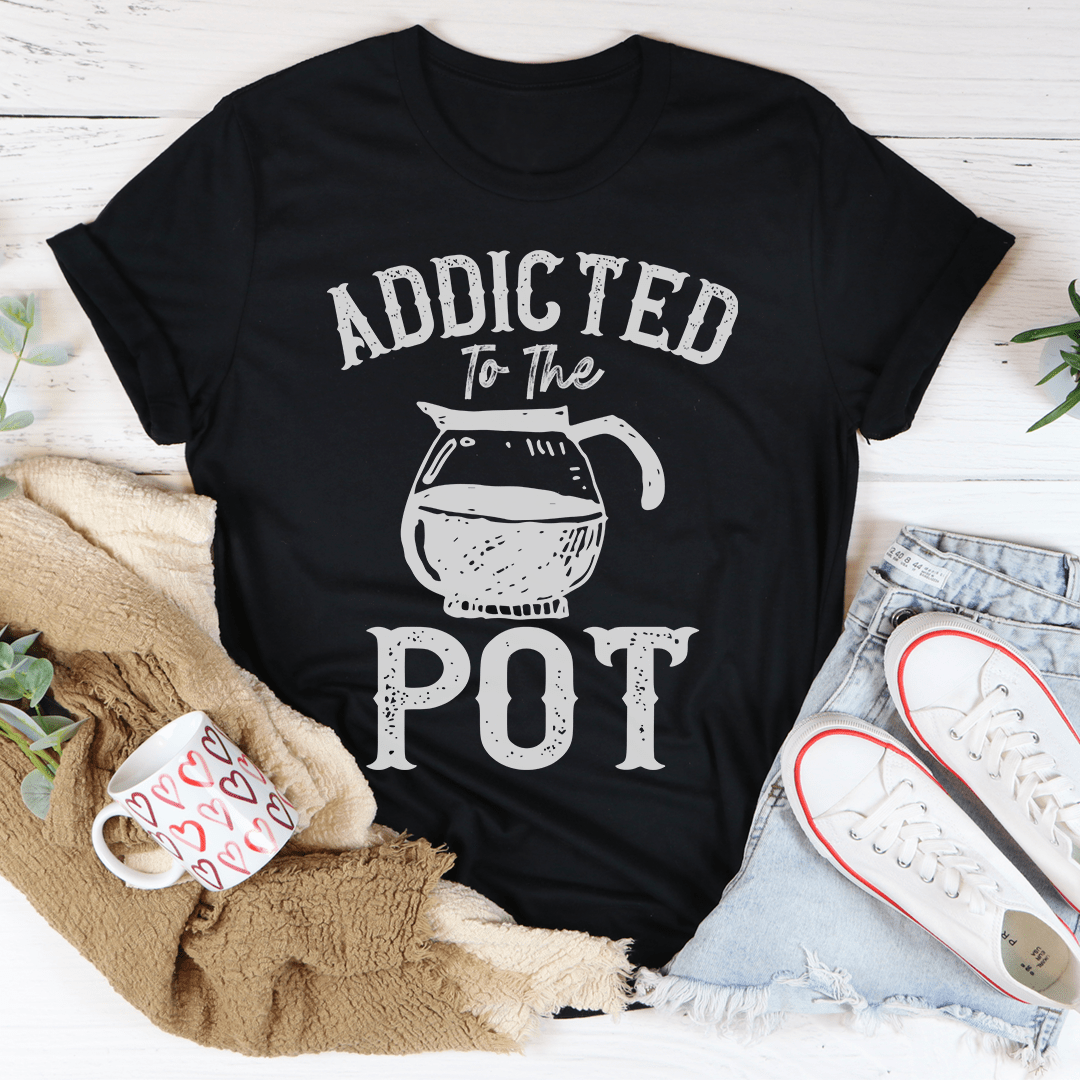 Addicted To The Pot Tee featuring a playful slogan on a soft cotton fabric, showcasing its durability and stylish design.