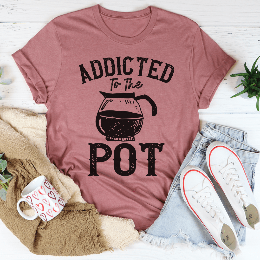 Addicted To The Pot Tee featuring a playful slogan on a soft cotton fabric, showcasing its durability and stylish design.