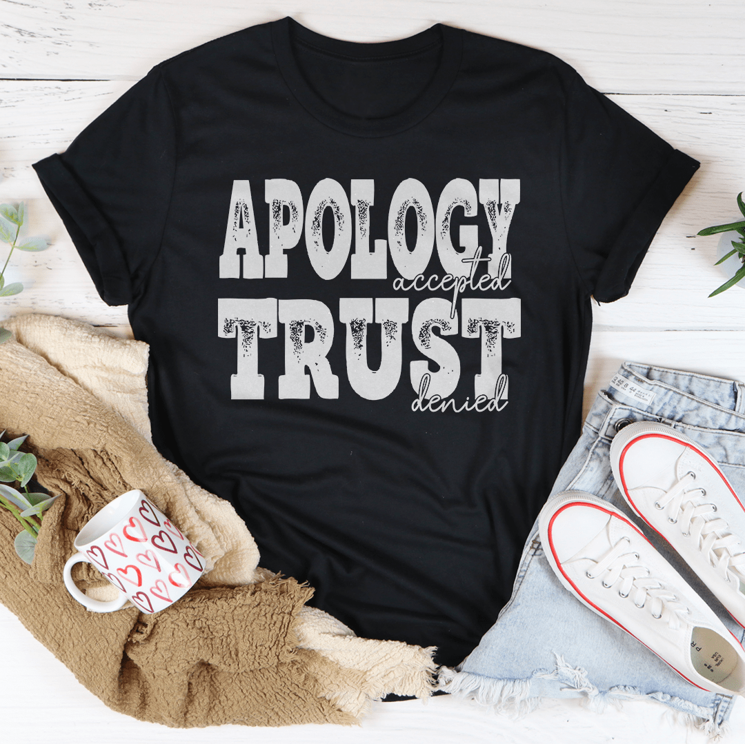 Apology Accepted Trust Denied T-Shirt displayed on a mannequin, showcasing its unique design and soft fabric.