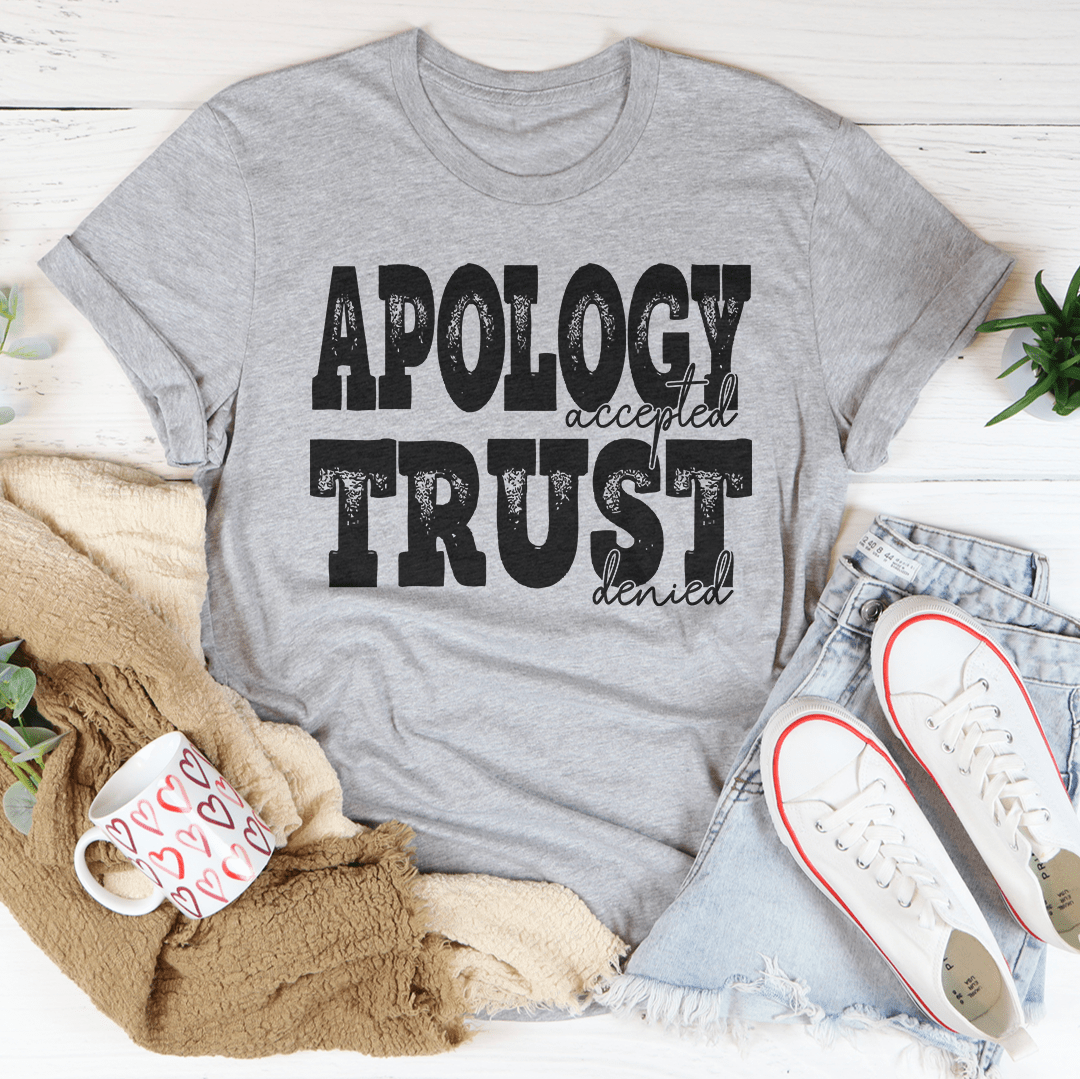 Apology Accepted Trust Denied T-Shirt displayed on a mannequin, showcasing its unique design and soft fabric.