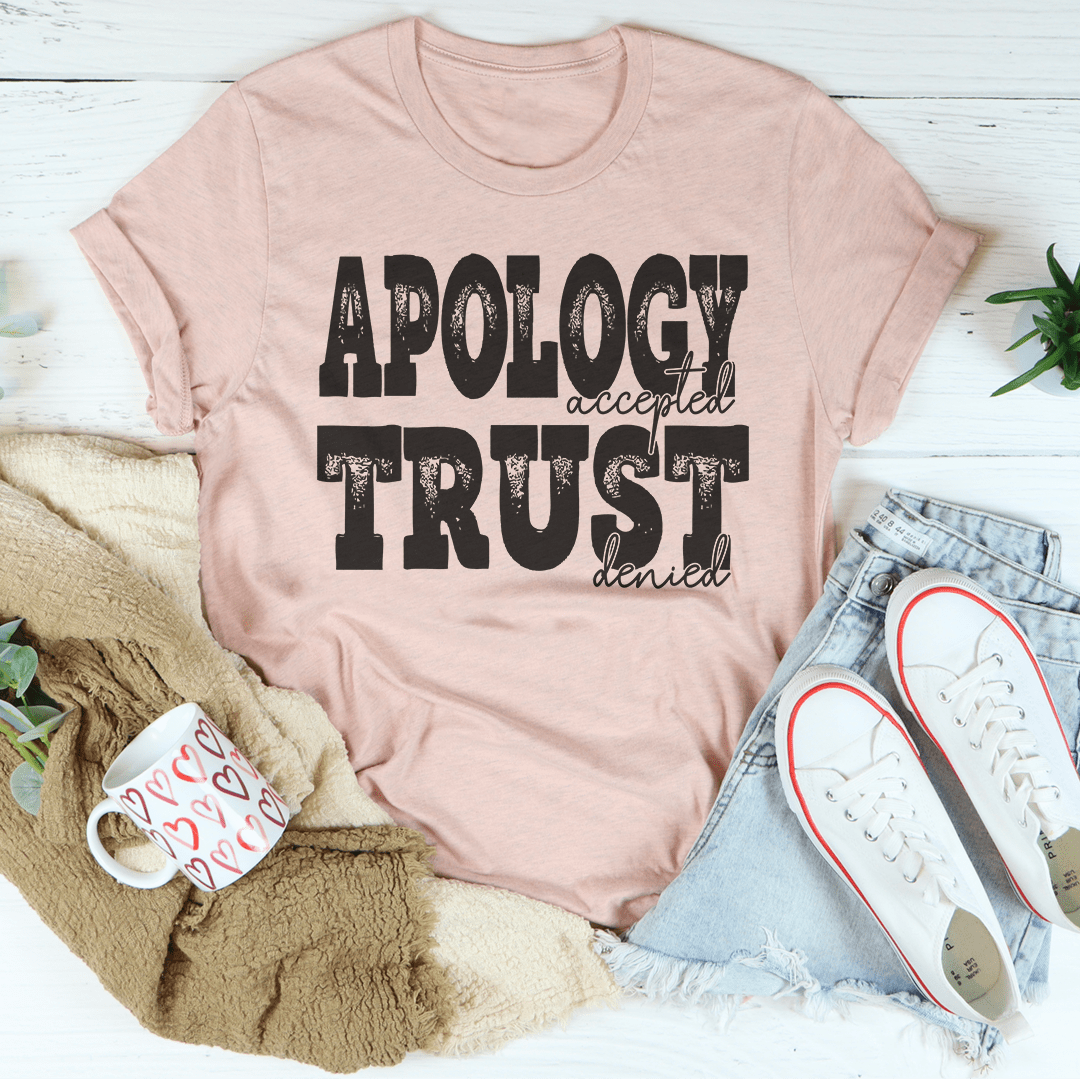 Apology Accepted Trust Denied T-Shirt displayed on a mannequin, showcasing its unique design and soft fabric.