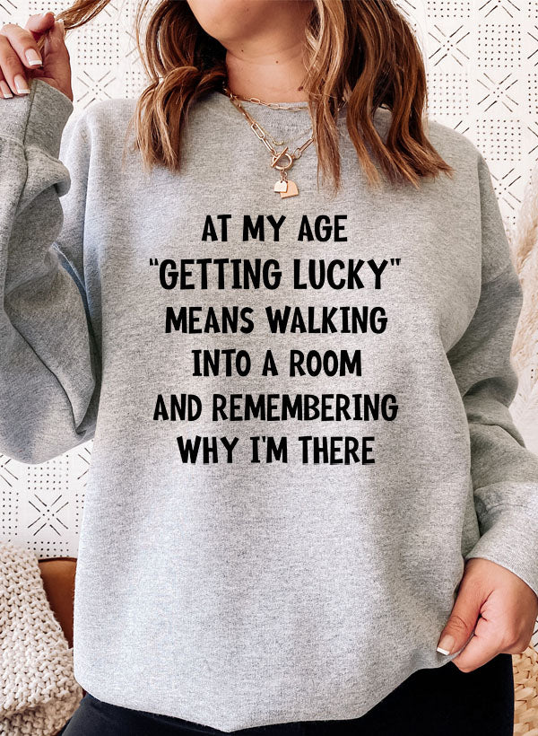 At My Age Getting Lucky Sweat Shirt featuring a cozy fleece lining and adjustable cuffs, designed by top artists.