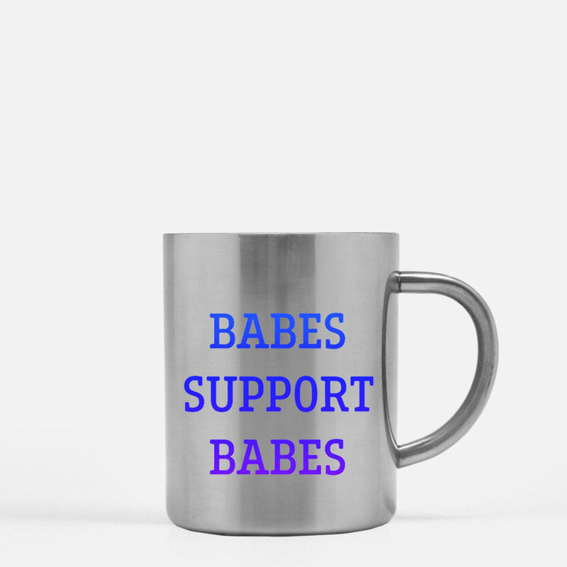 Babes Support Babes Gold & Silver Mug showcasing elegant design with gold metallic coating and ceramic material.