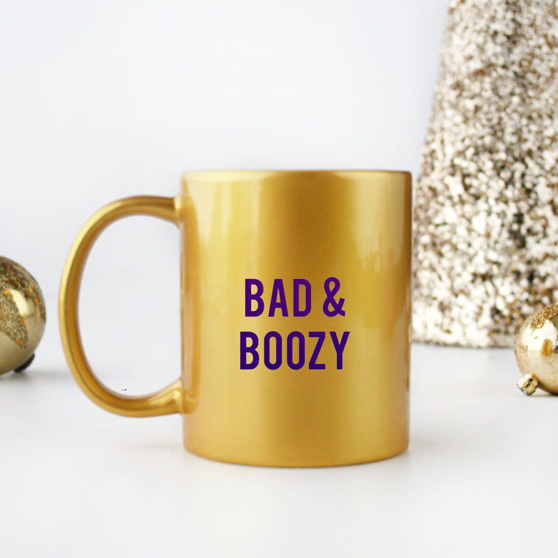 Bad And Boozy Gold & Silver Mug with elegant design and metallic finish, perfect for stylish sipping.