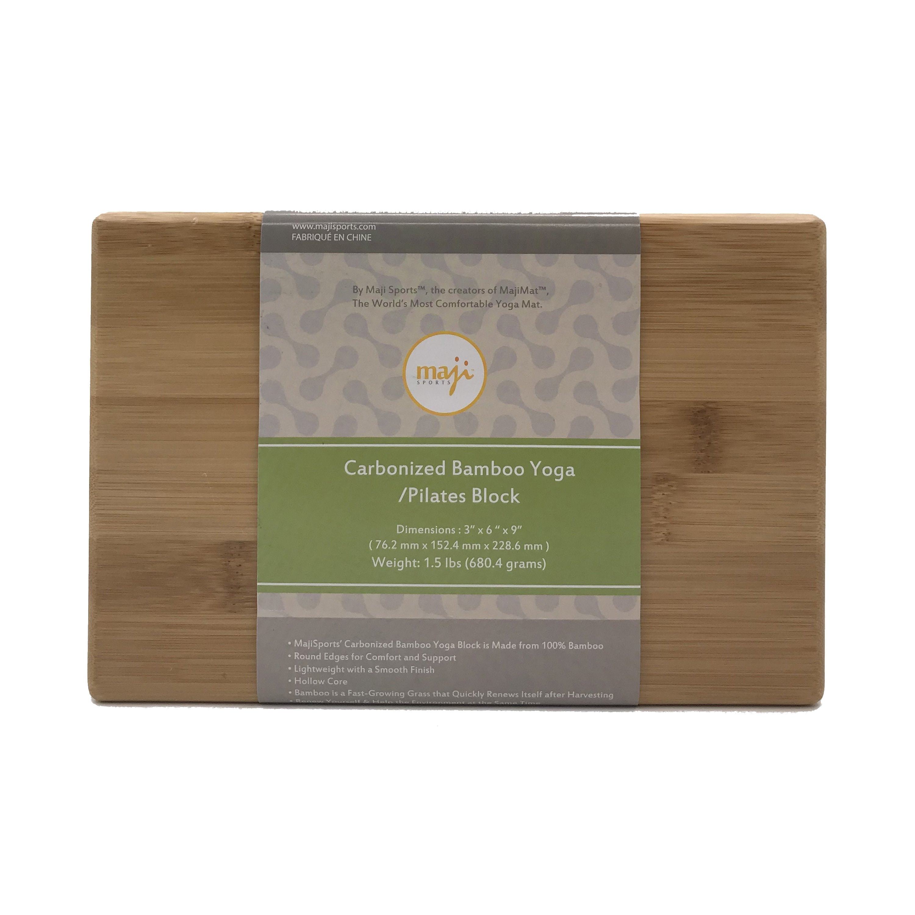 Eco-friendly Bamboo Yoga Block with smooth finish and round edges, ideal for yoga practice.