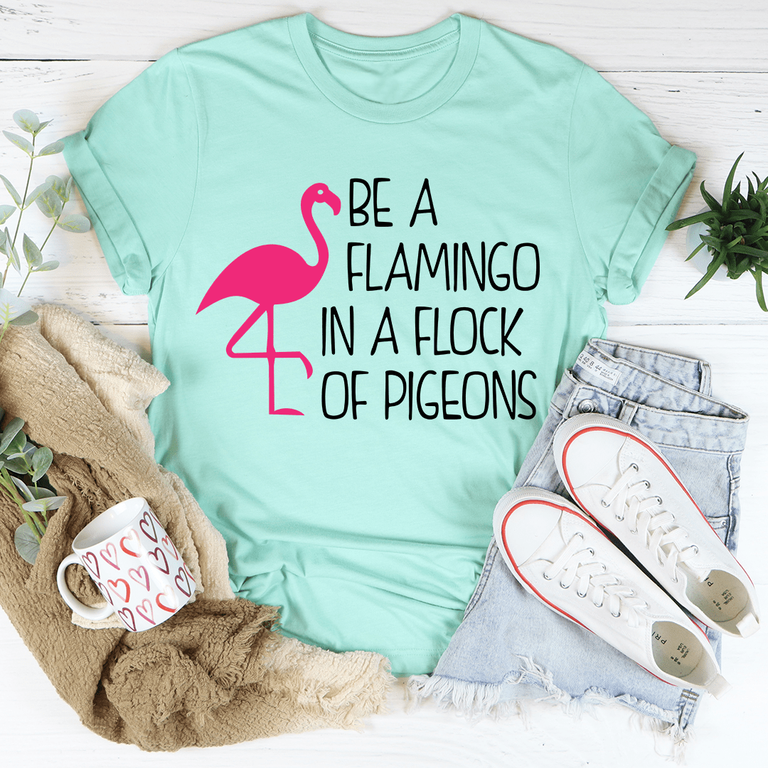 Be A Flamingo In A Flock Of Pigeons T-Shirt featuring vibrant colors and a comfortable fit, perfect for casual wear.