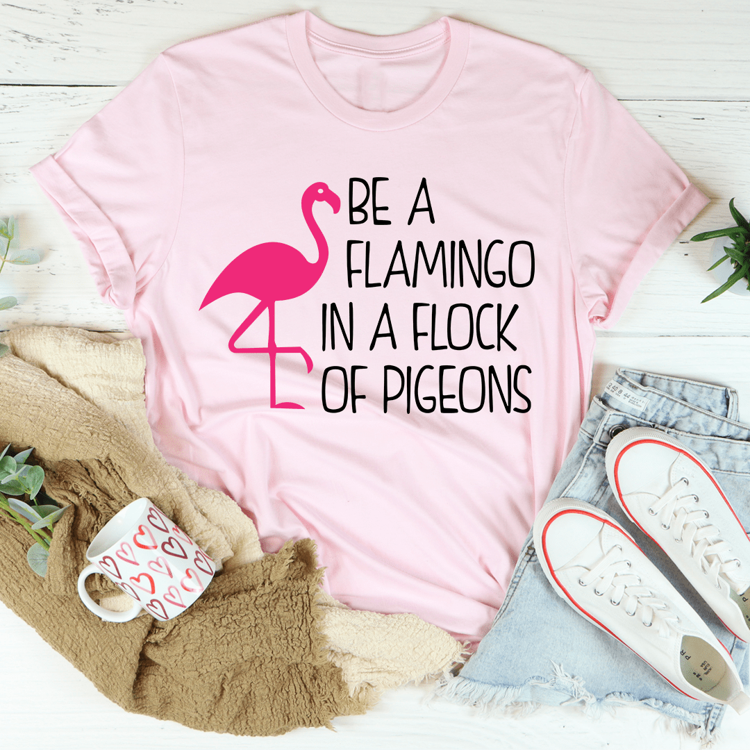 Be A Flamingo In A Flock Of Pigeons T-Shirt featuring vibrant colors and a comfortable fit, perfect for casual wear.