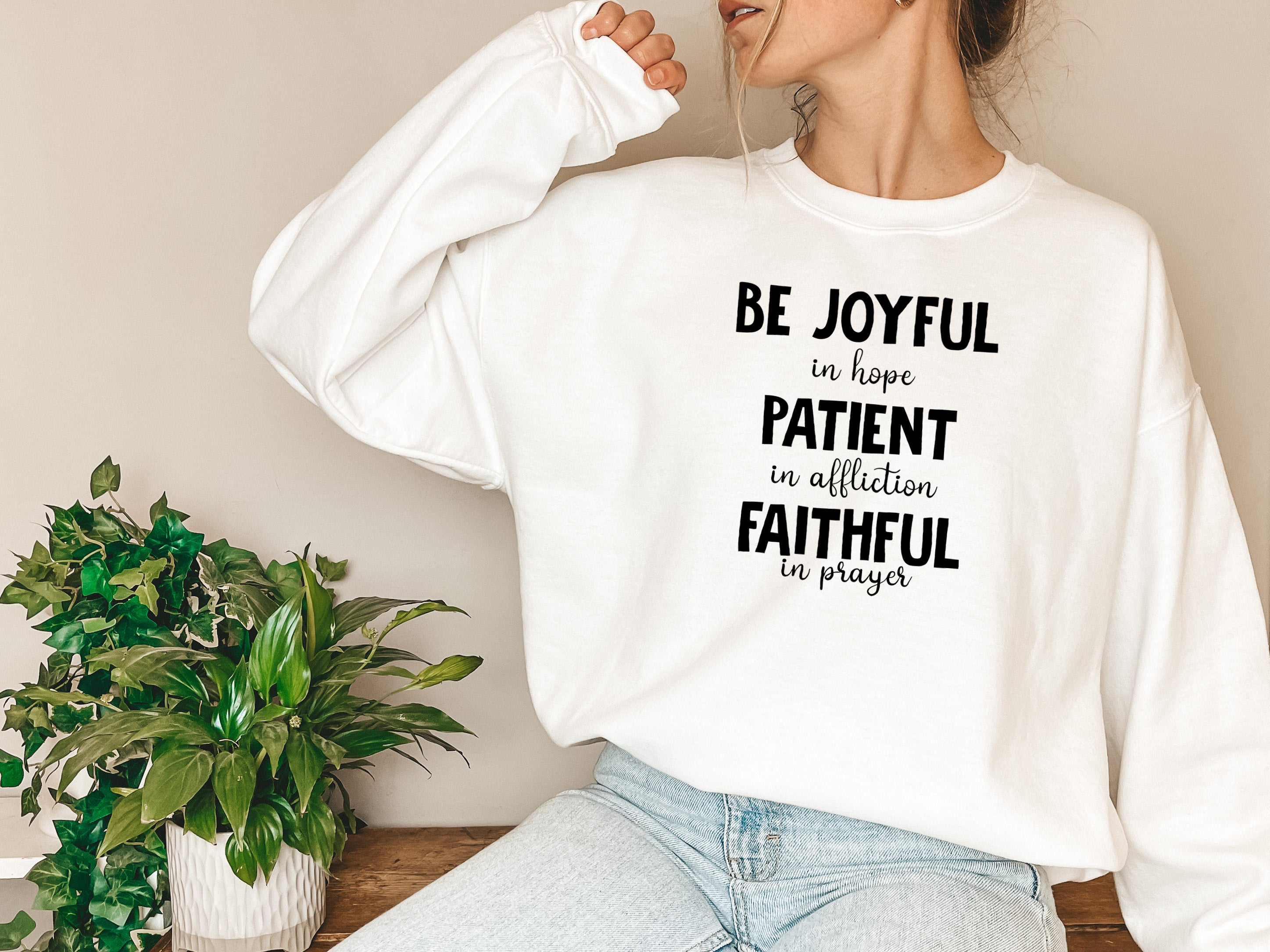 Be Joyful In Hope Patient In Affliction Faithful In Prayer Sweatshirt featuring a cozy fleece lining and inspirational text design.