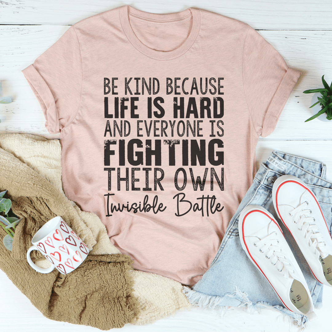 Be Kind Because Life Is Hard T-Shirt in soft cotton, featuring a durable design and a meaningful message.