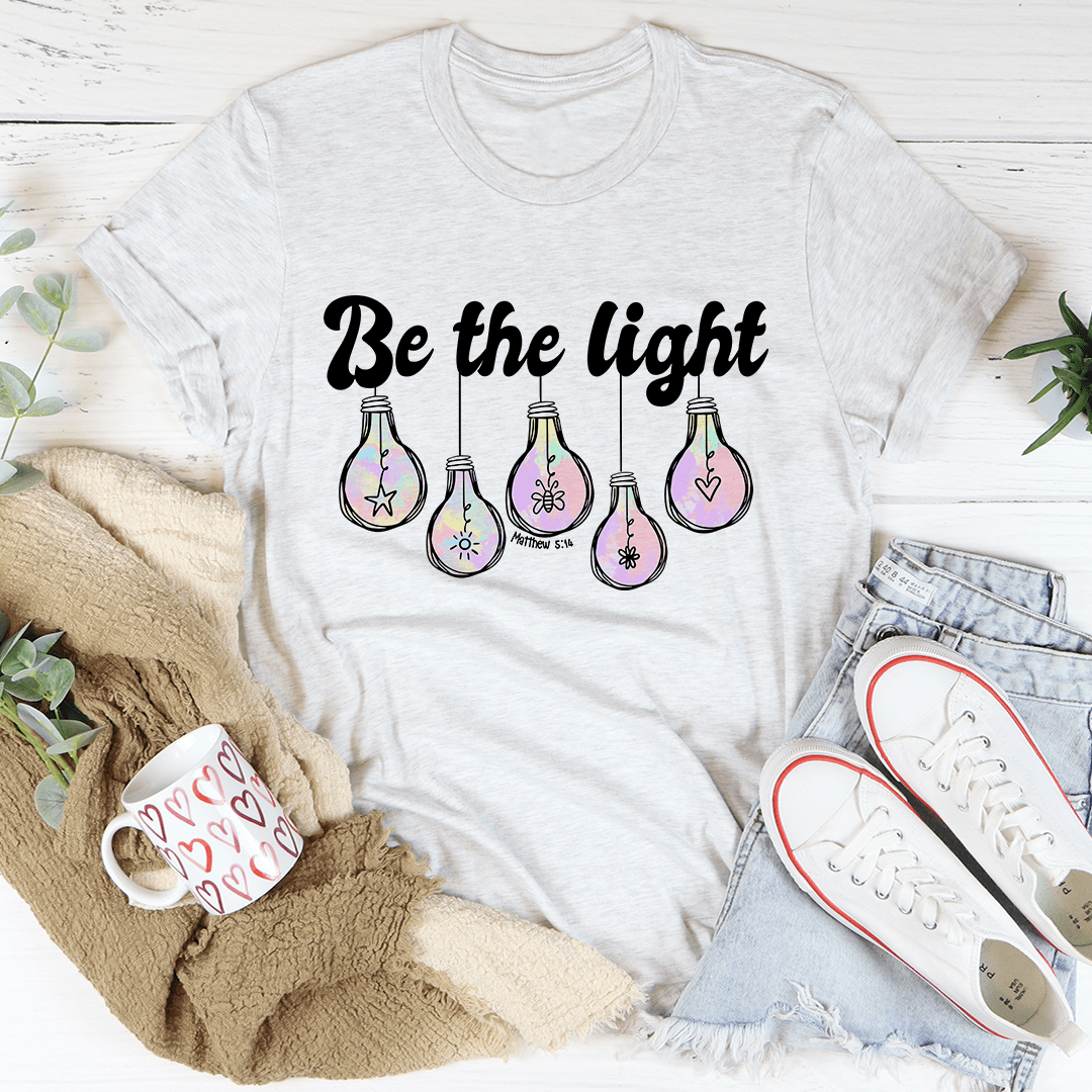 Be The Light Matthew 5:14 T-Shirt made of soft cotton, featuring double stitching for durability and an inspirational design.